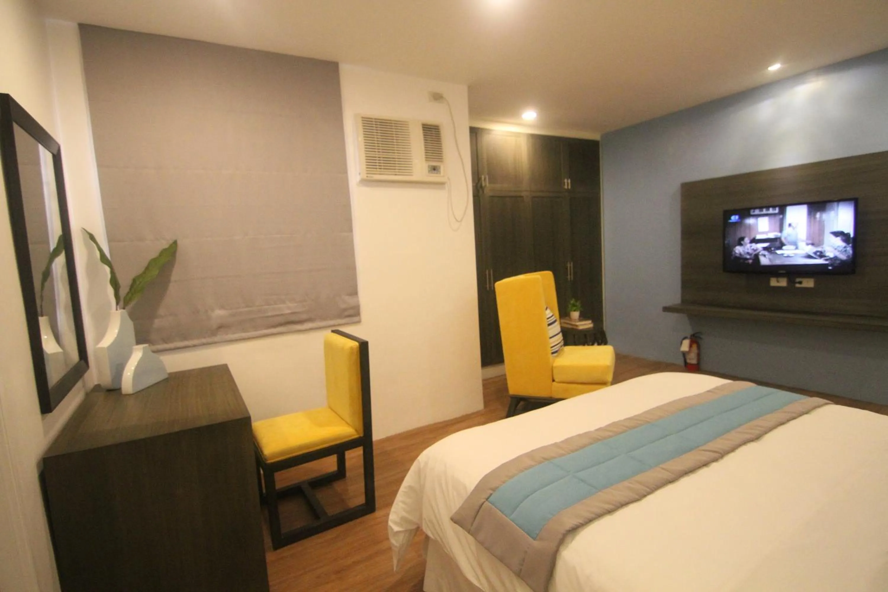 Bed in Bryan Condo Suites Makati near Airport