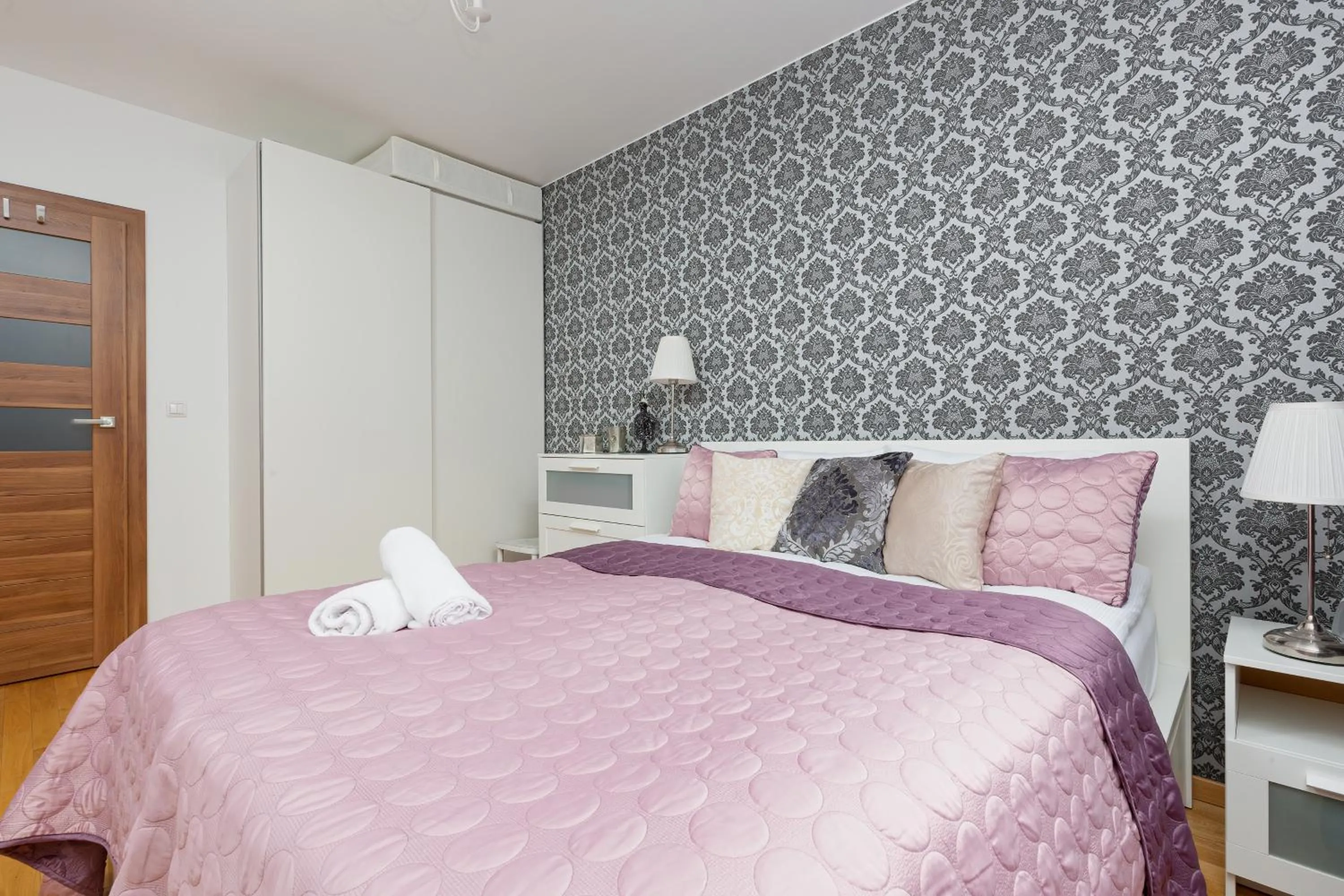 Bed in Atrium Ursus Warsaw Apartments by Noclegi Renters