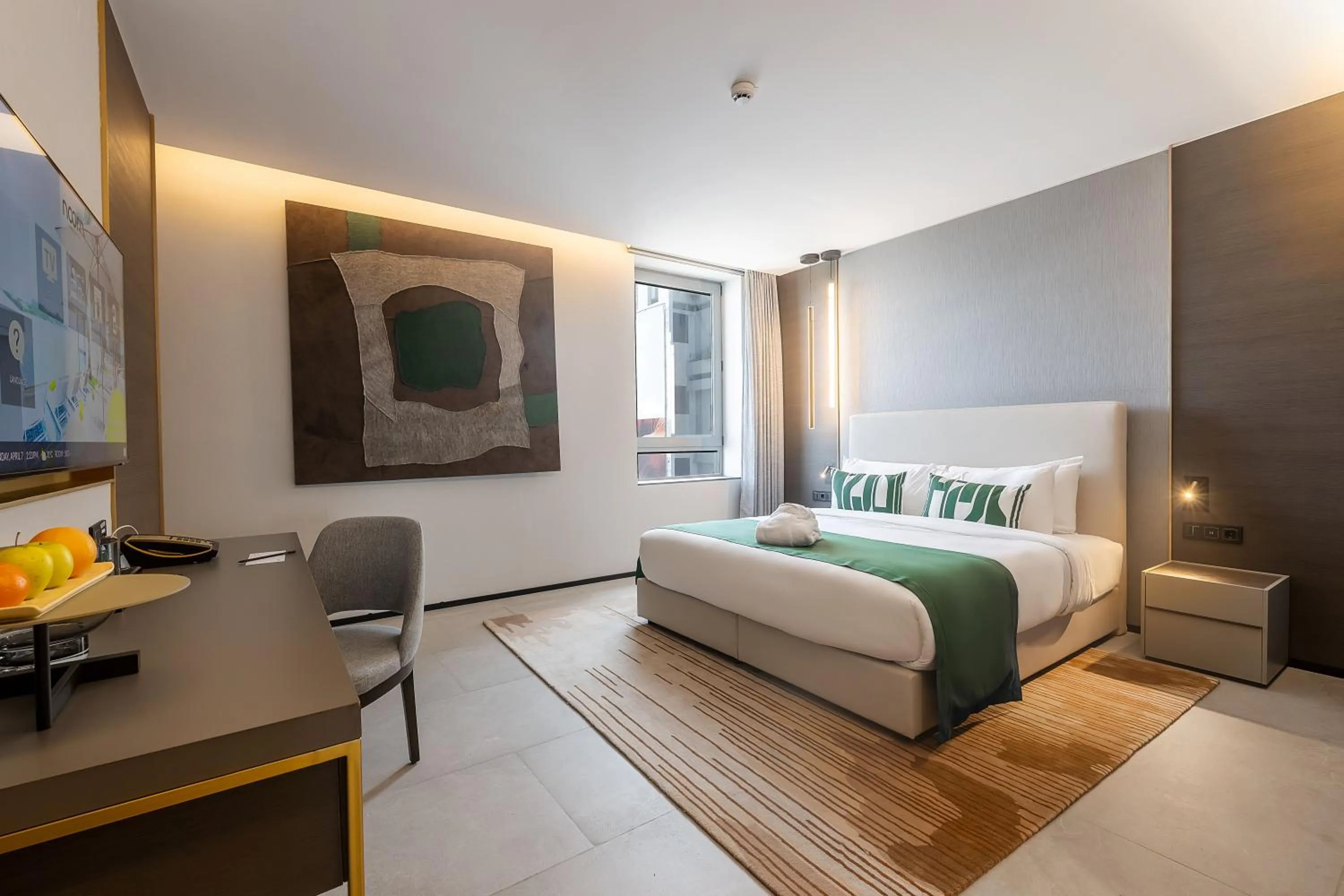 Bed in Noom Hotel Abidjan Plateau