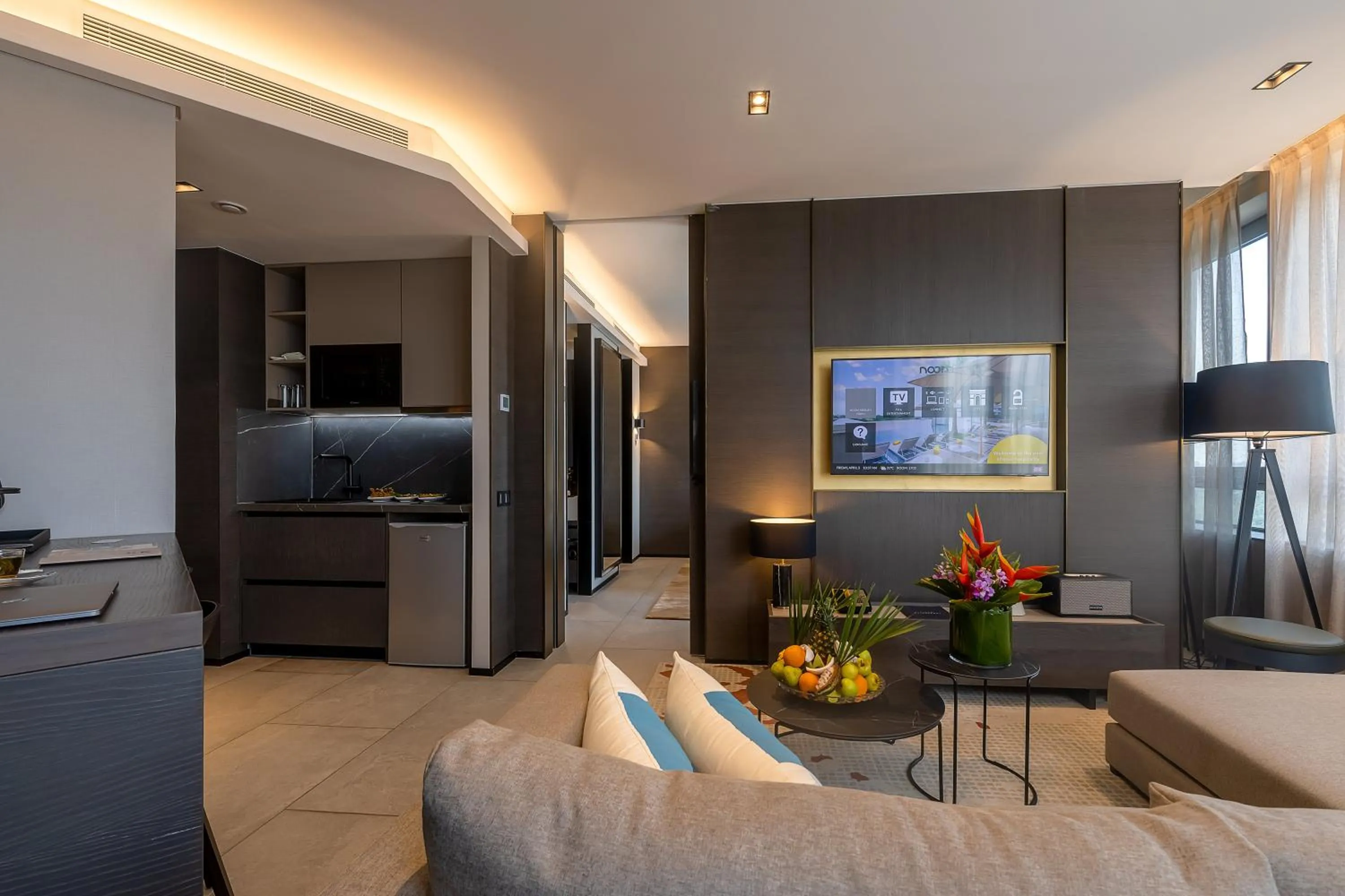 Communal lounge/ TV room in Noom Hotel Abidjan Plateau