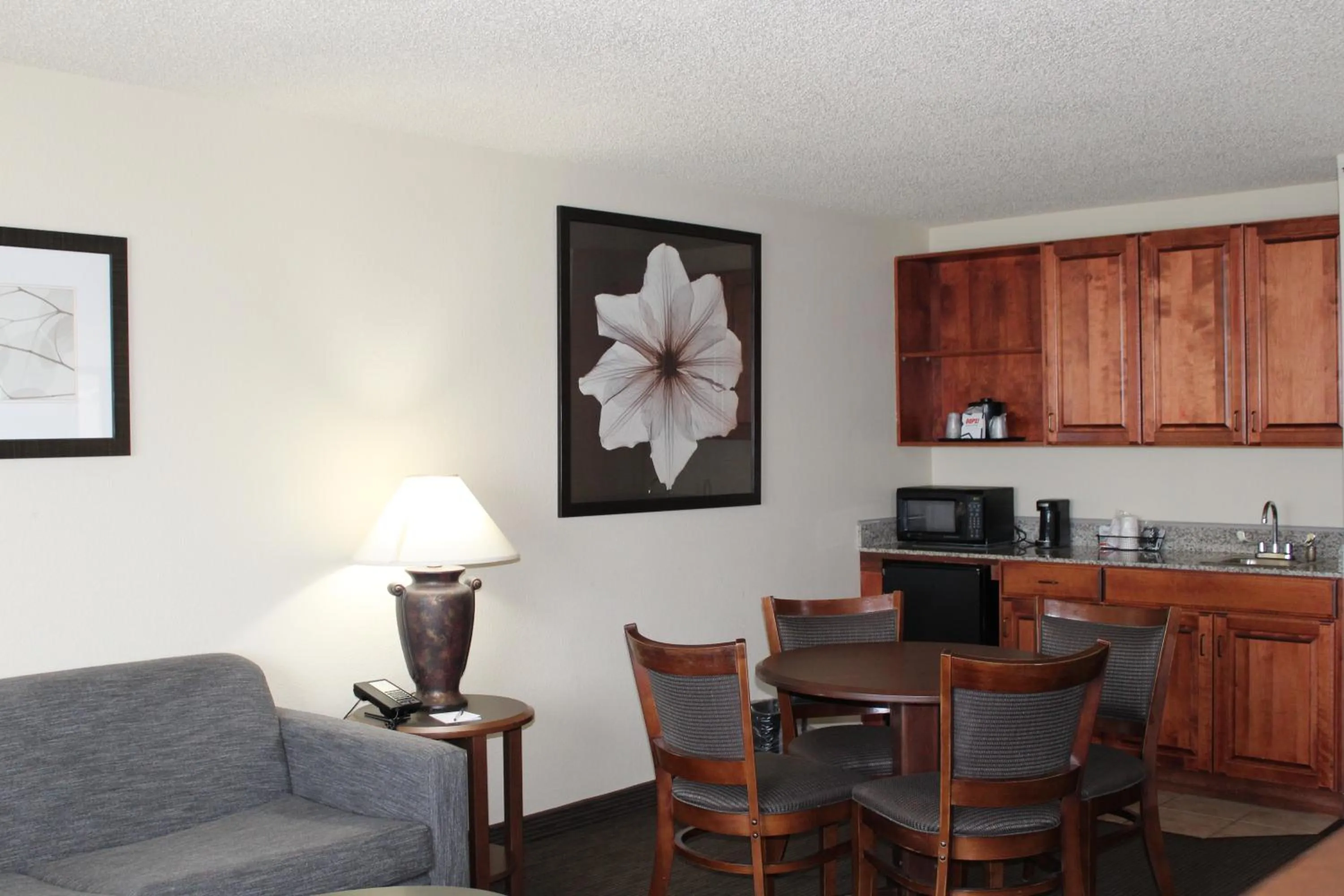 Living room in AmericInn by Wyndham Windsor Ft. Collins