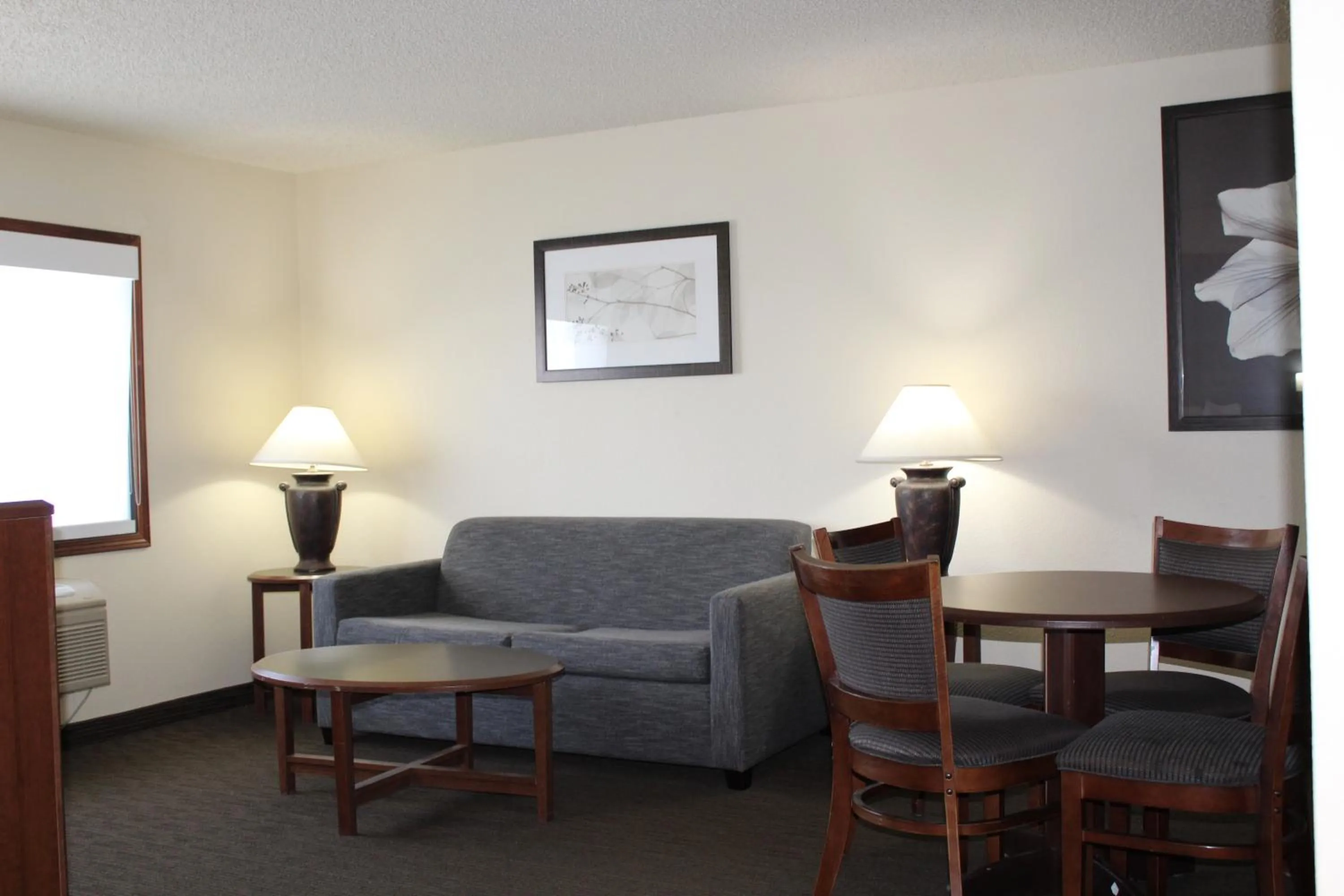 Living room in AmericInn by Wyndham Windsor Ft. Collins