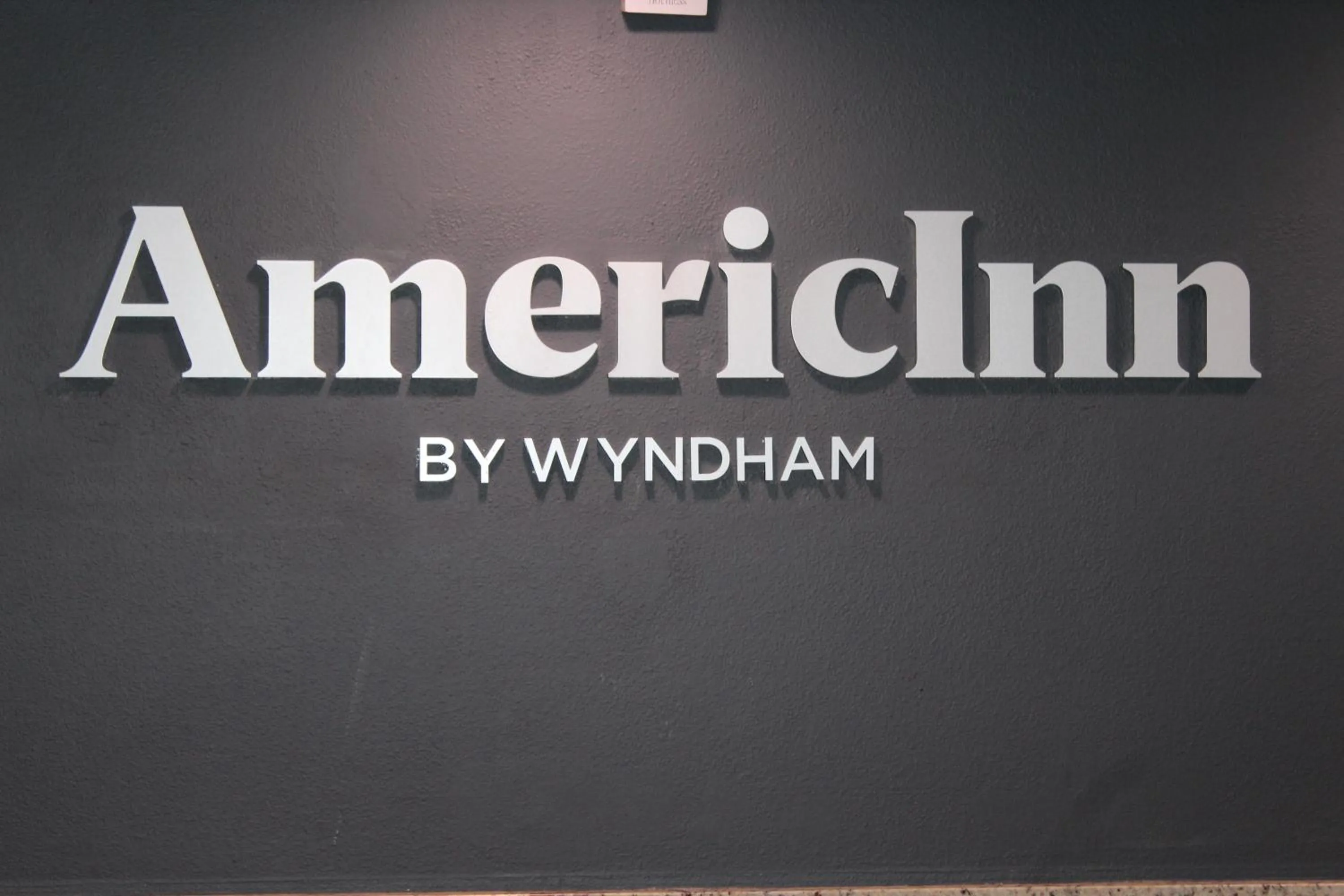 Property logo or sign in AmericInn by Wyndham Windsor Ft. Collins
