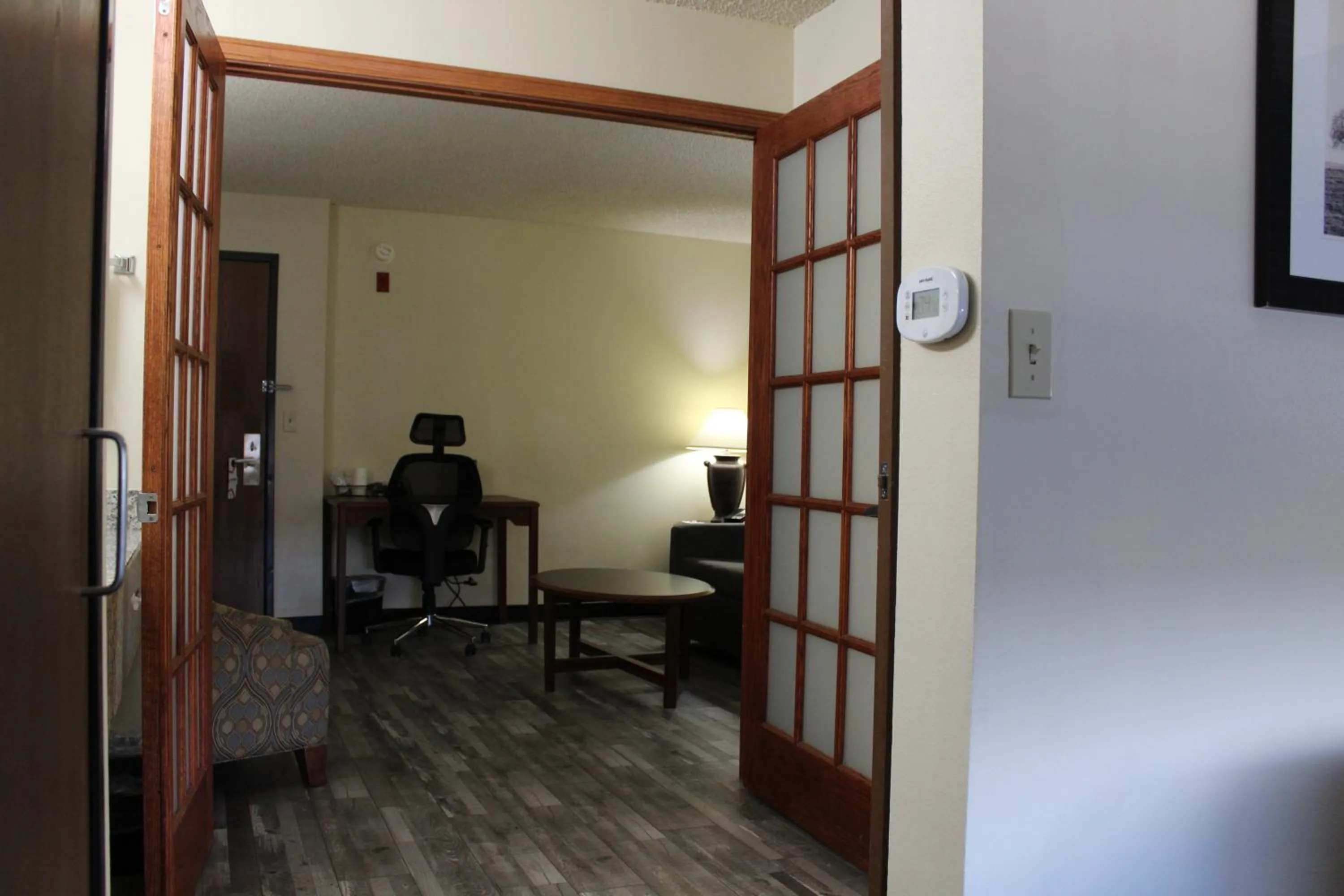 Living room in AmericInn by Wyndham Windsor Ft. Collins