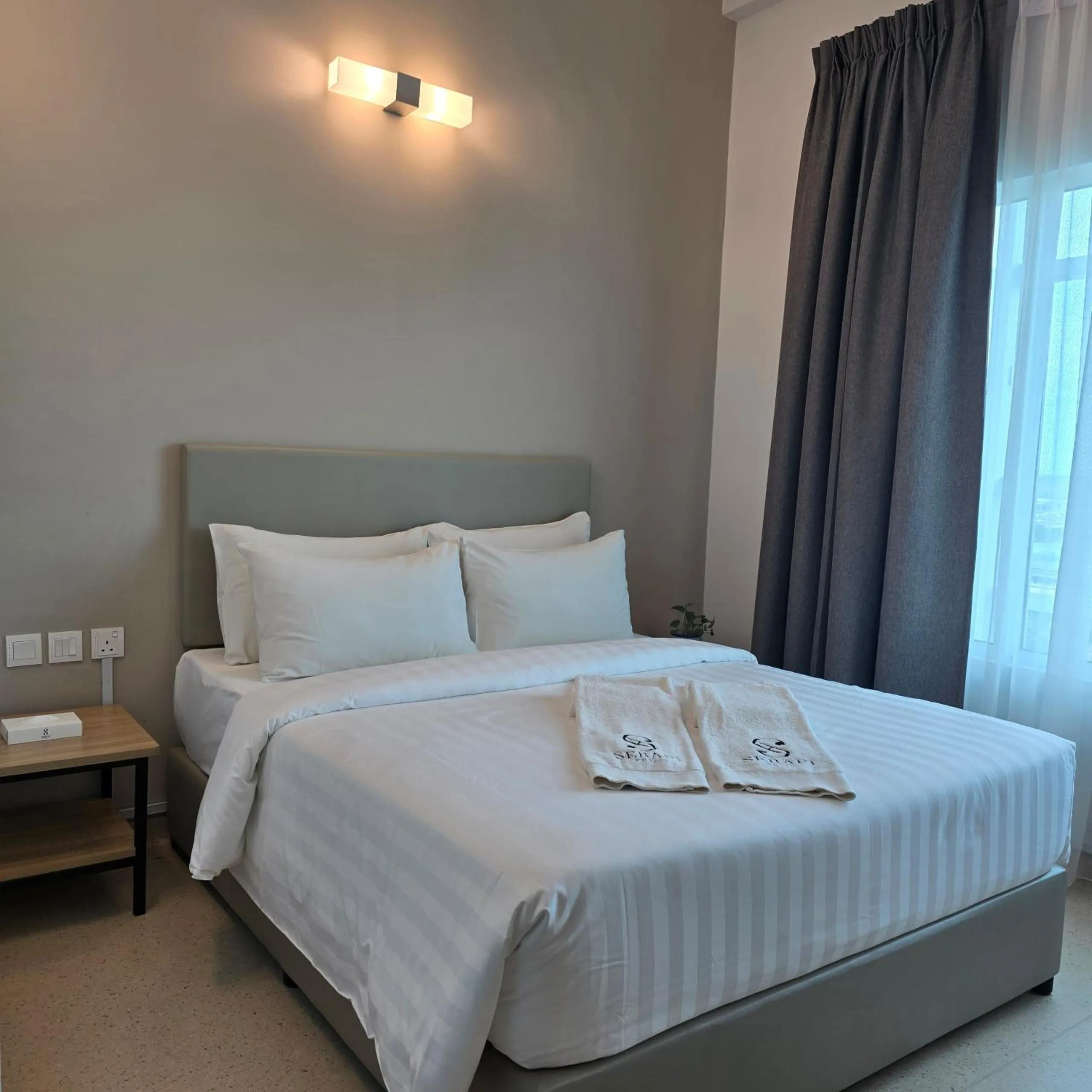 Bed in Serapi Verdure Hotel