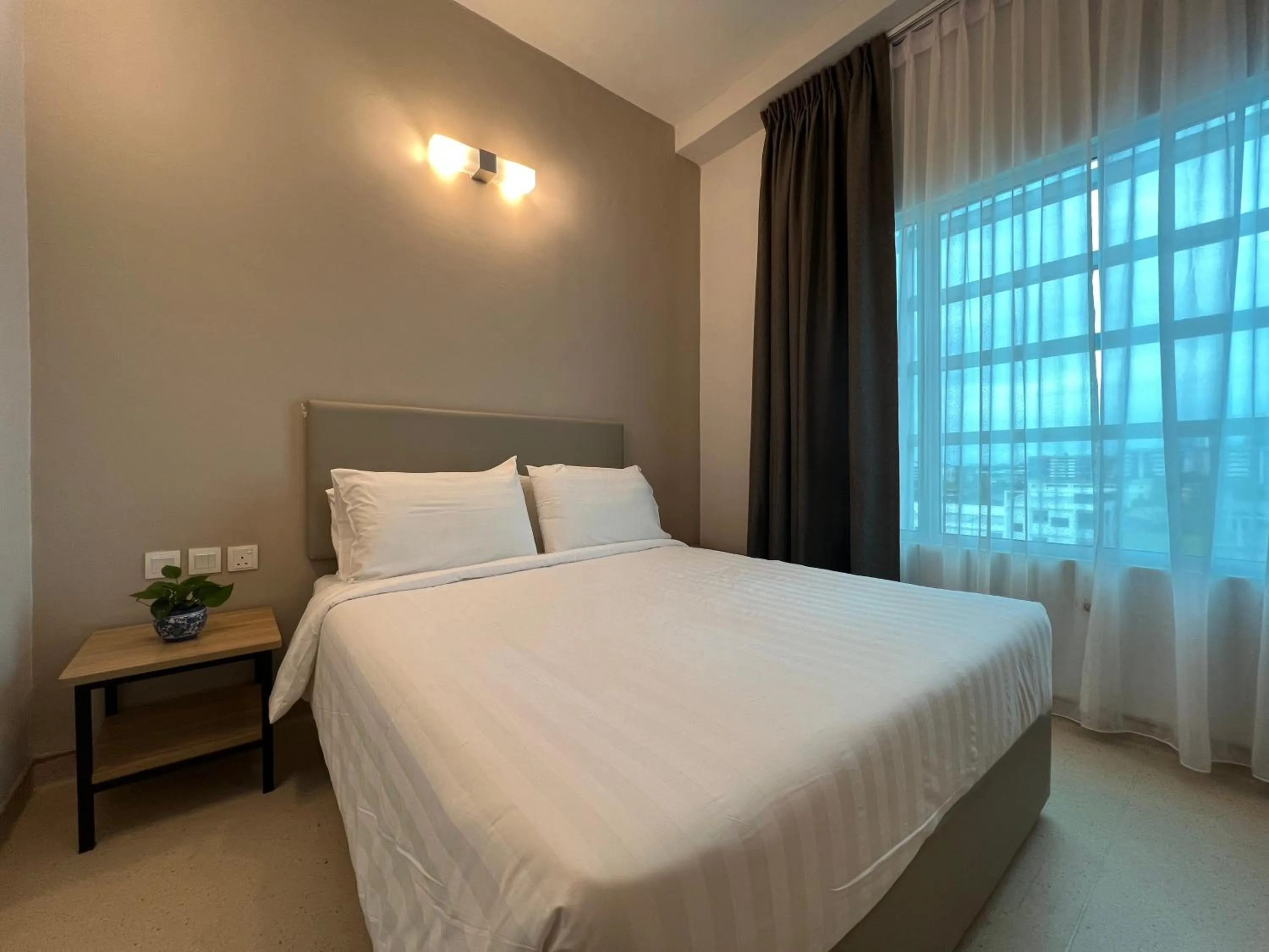 Bed in Serapi Verdure Hotel