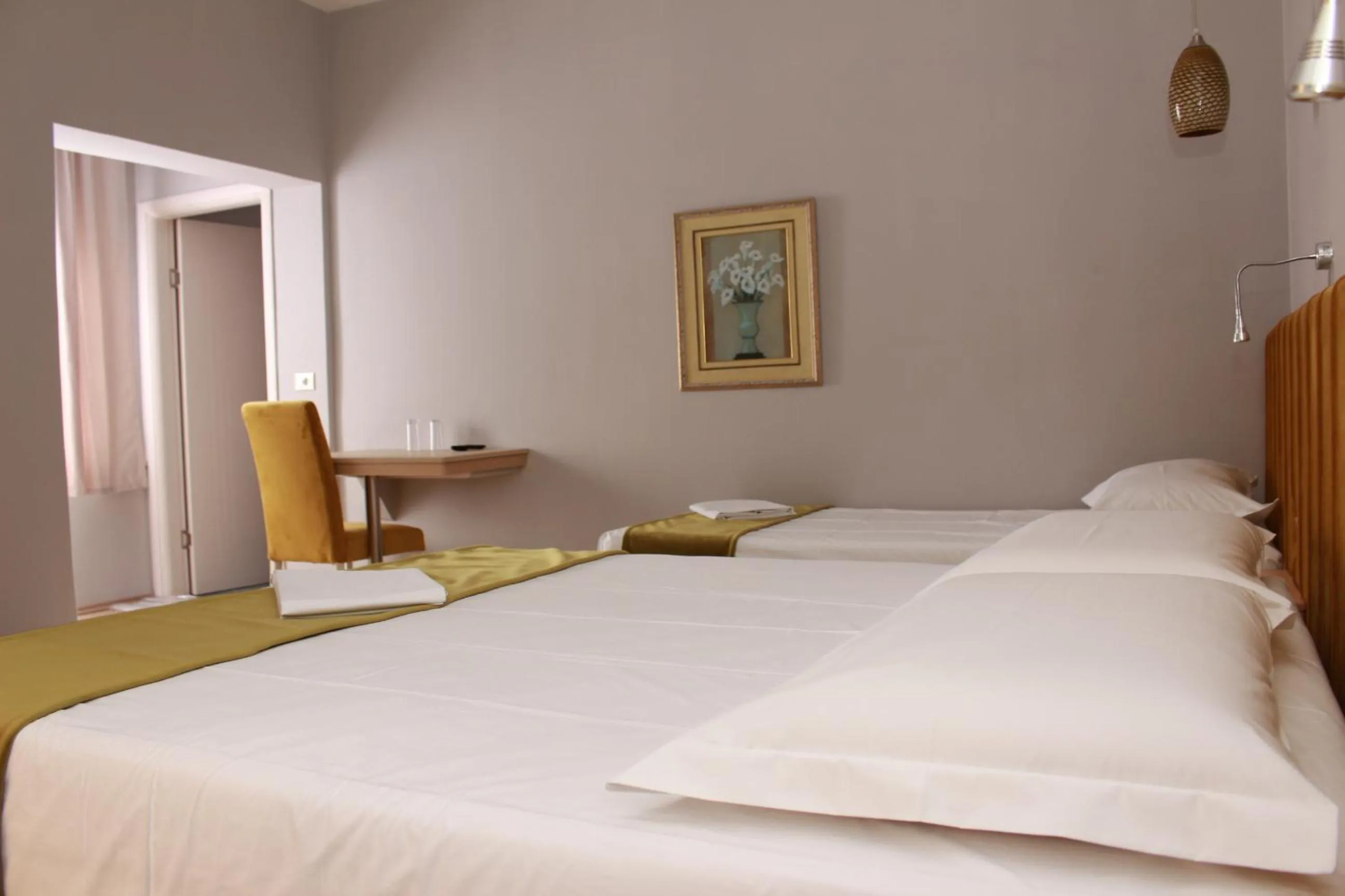 Bed in Theranda Boutique Hotel