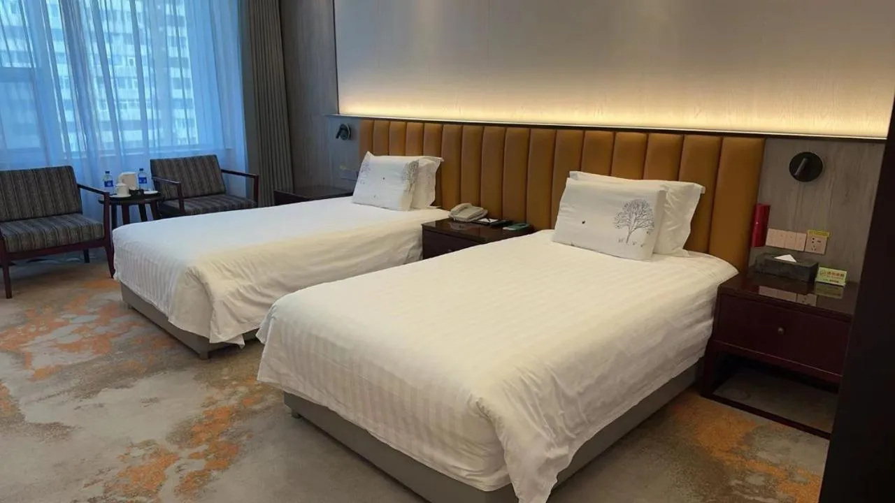 Bedroom, Bed in Beijing Jingyi Hotel