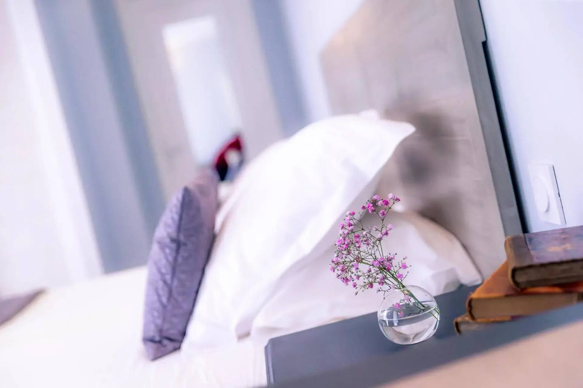 Decorative detail, Bed in Hotel Le Lion D'Or et Restaurant La Table Du Lion Decorative detail, Bed in Hotel Le Lion D'Or et Restaurant La Table Du Lion