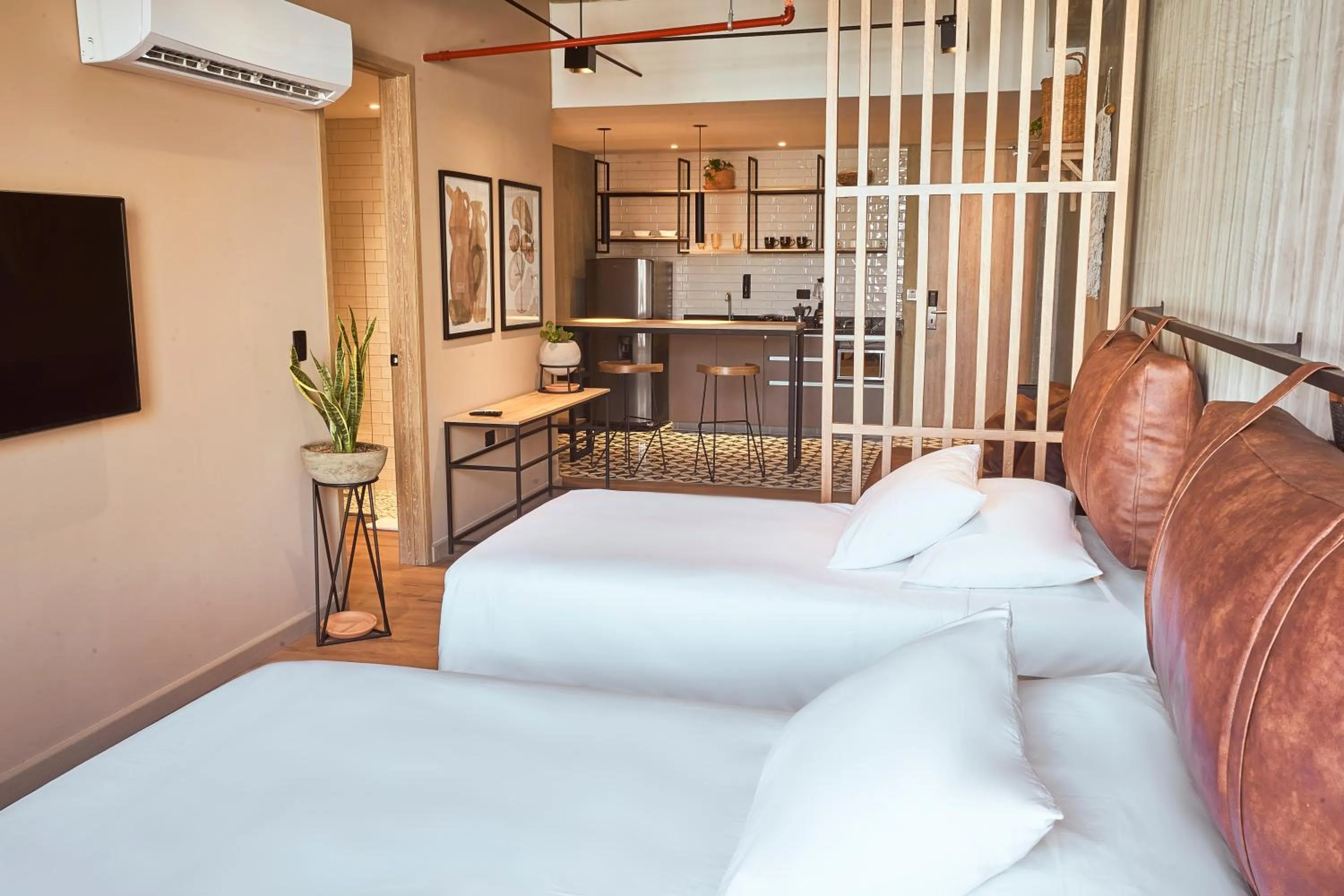 Bed in Mosaic Studios Buenavista