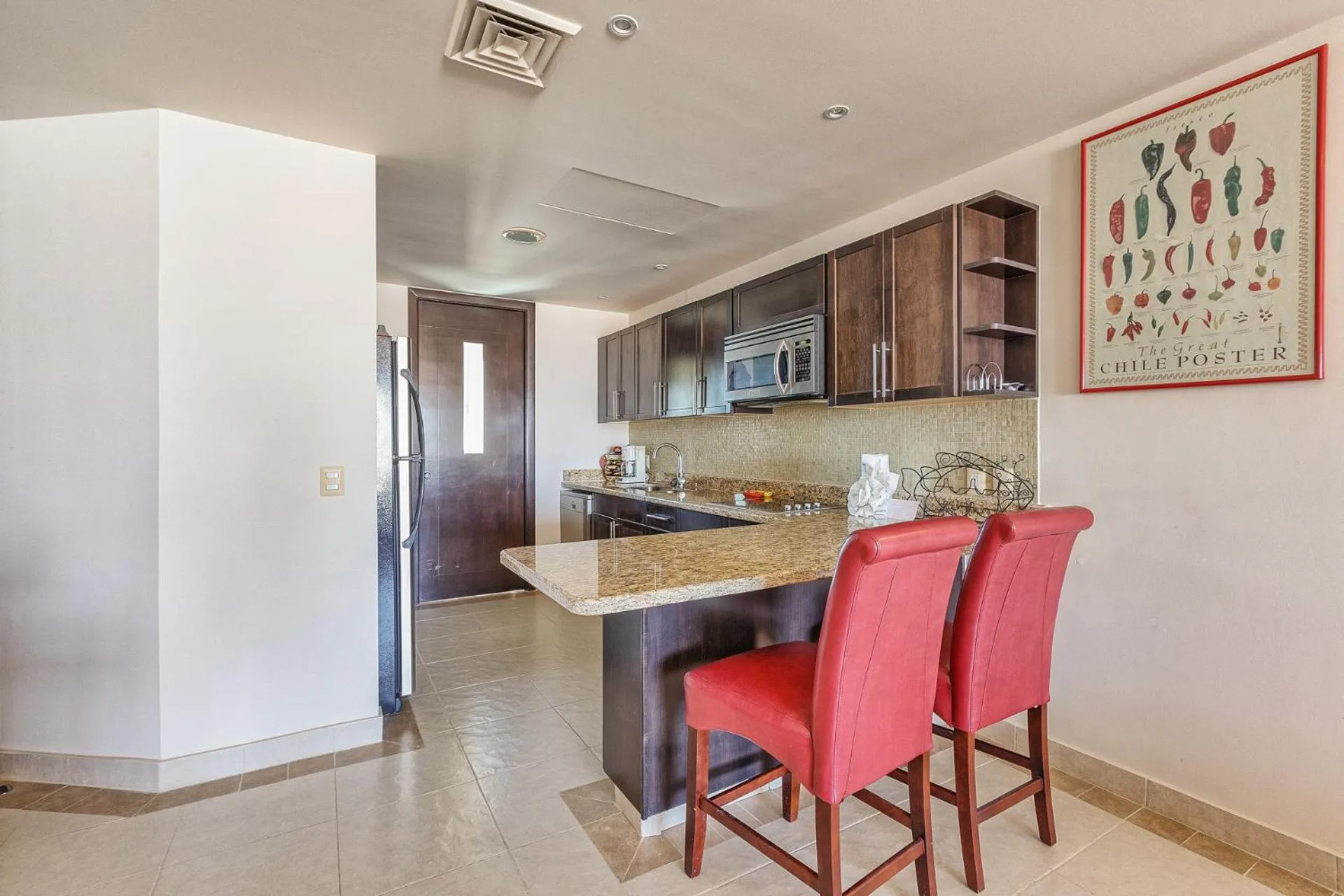 Kitchen or kitchenette in Mayan Lakes 14-203 by Kivoya