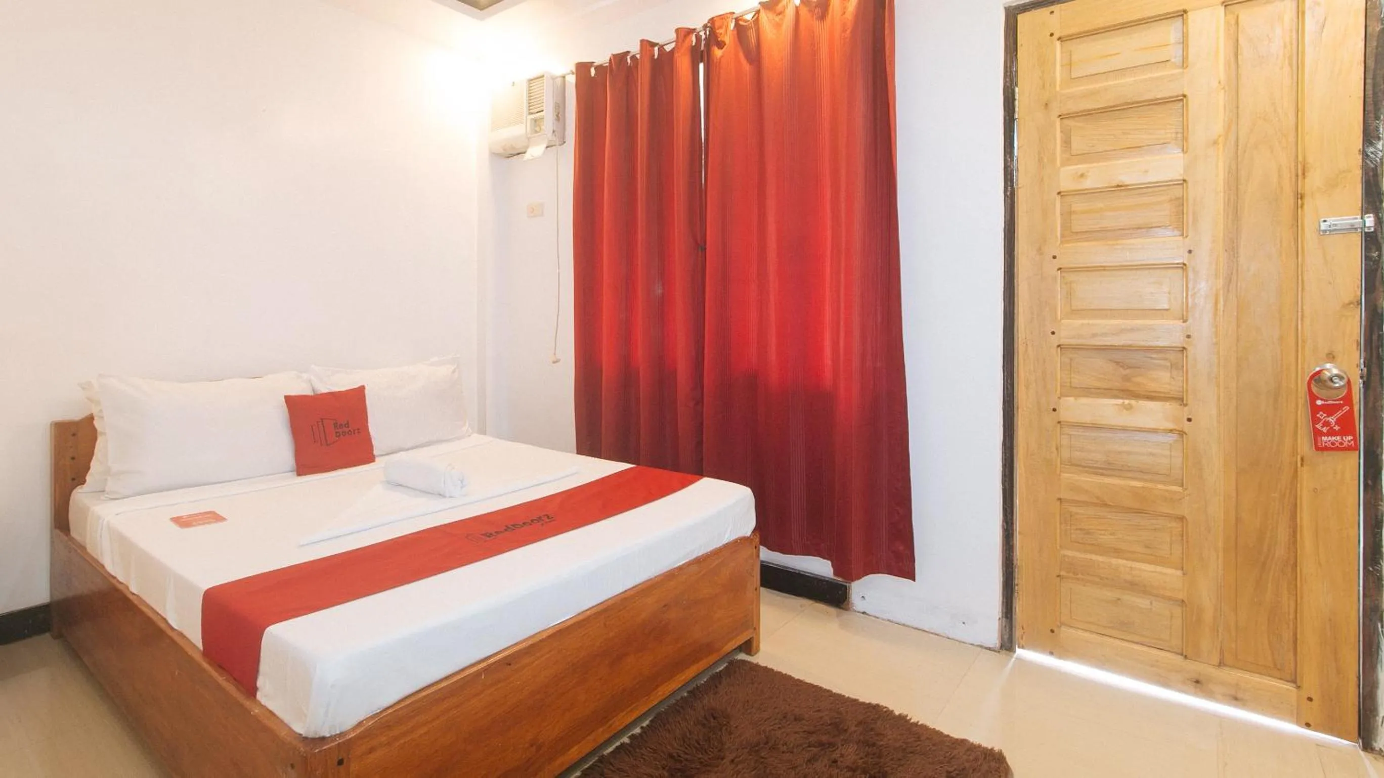 Bed in RedDoorz @ Lualhati Garden Cottage El Nido Palawan