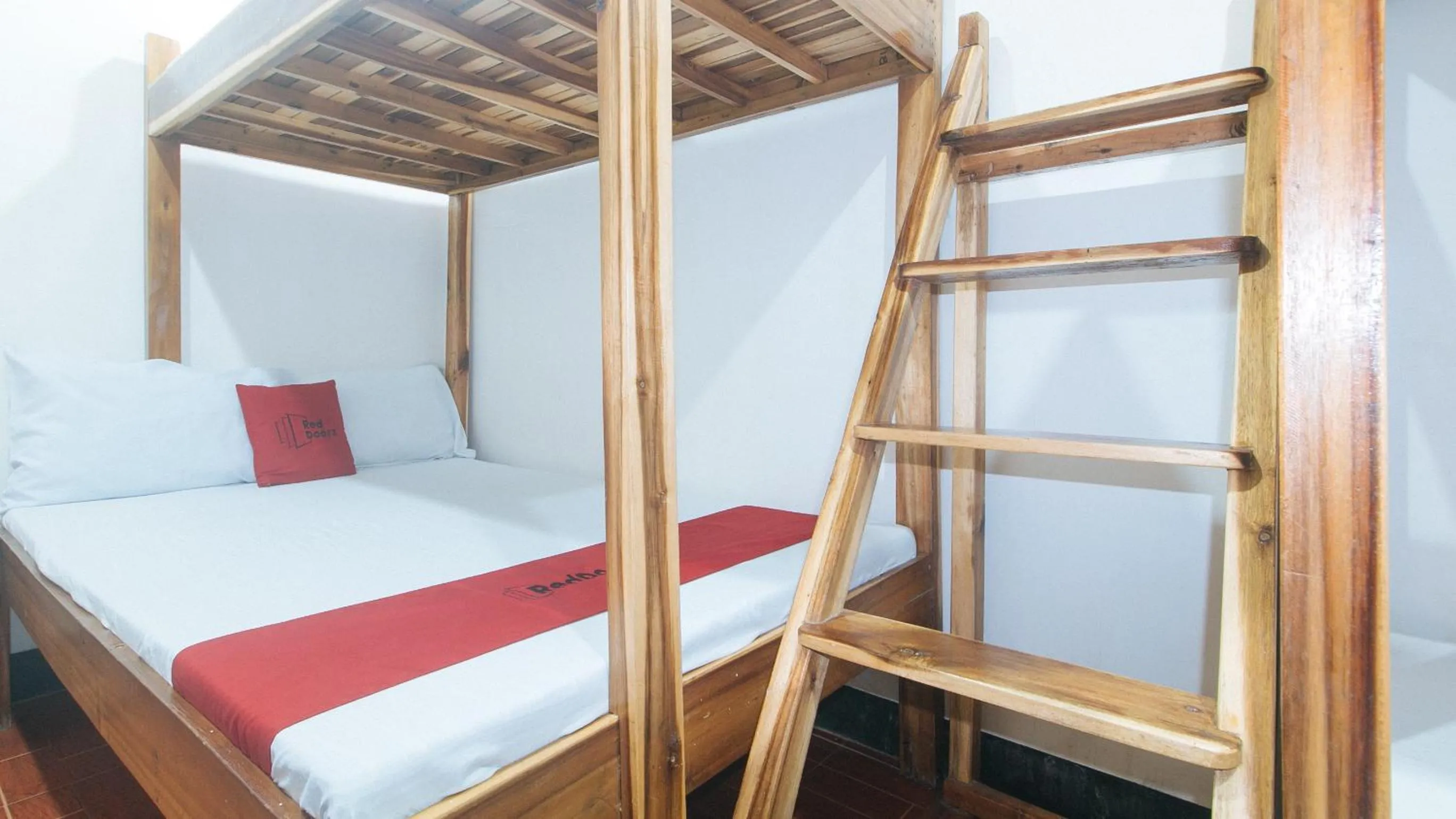 Photo of the whole room, Bed in RedDoorz @ Lualhati Garden Cottage El Nido Palawan