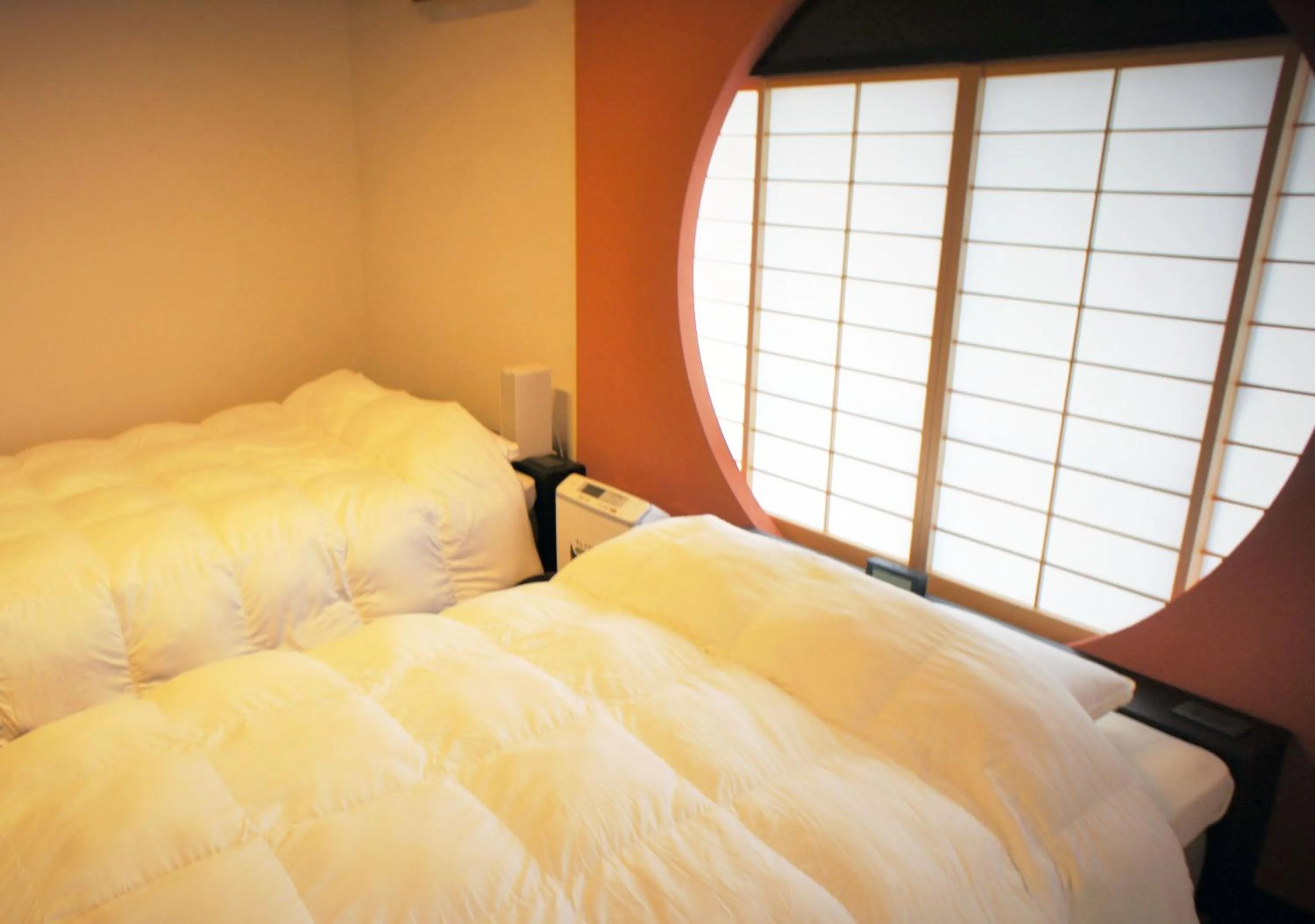 Bed in ATAMI SPRING TERRACE HOTEL