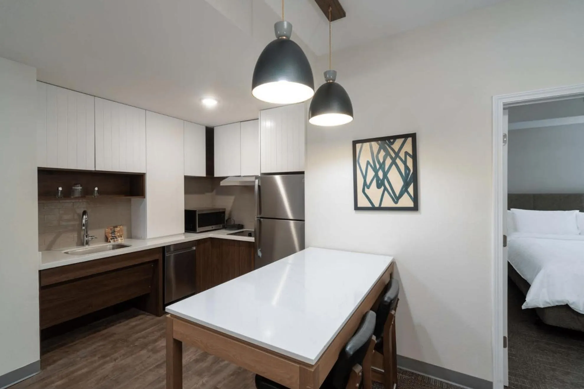 Kitchen or kitchenette, Bed in Staybridge Suites - Flowood - NW Jackson by IHG