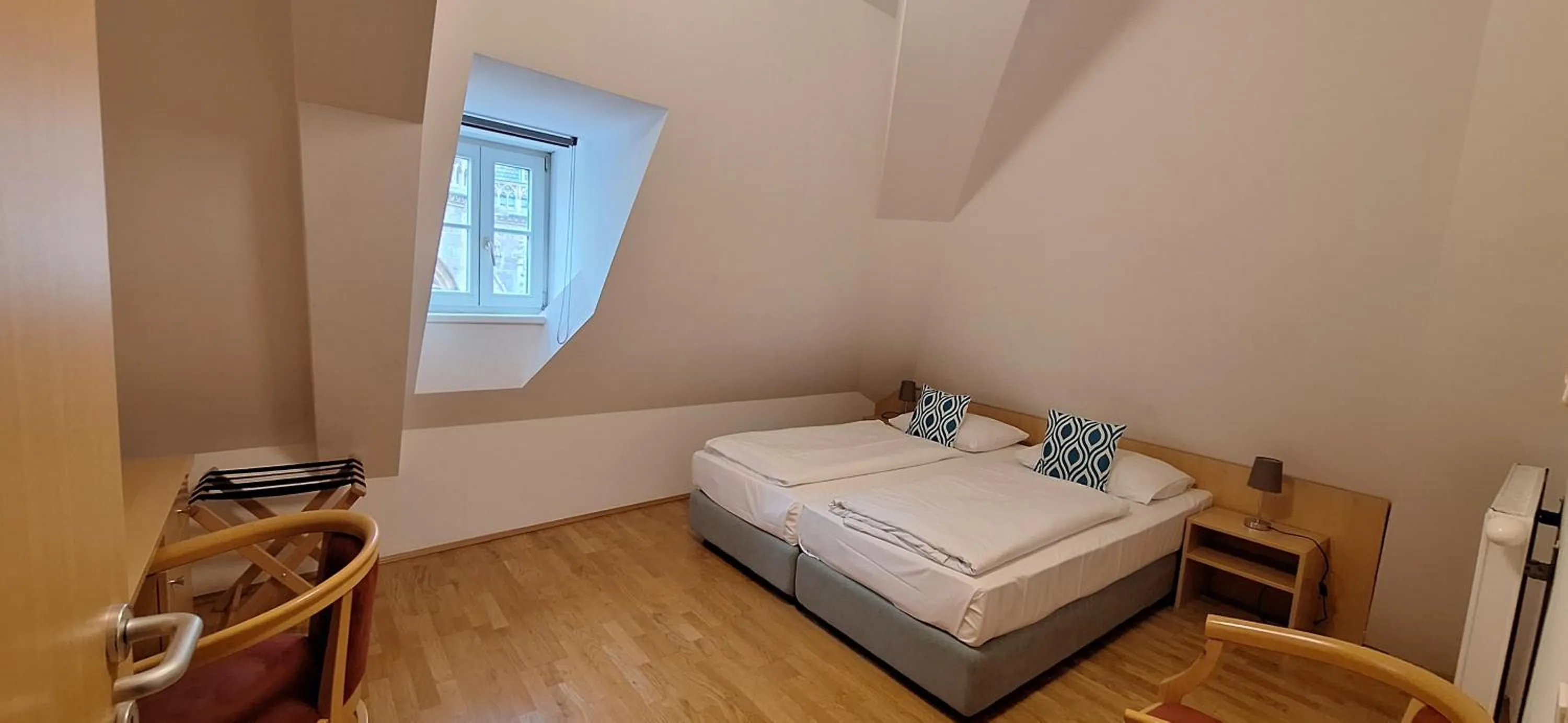 Photo of the whole room, Bed in Gästehaus Deutscher Orden Wien