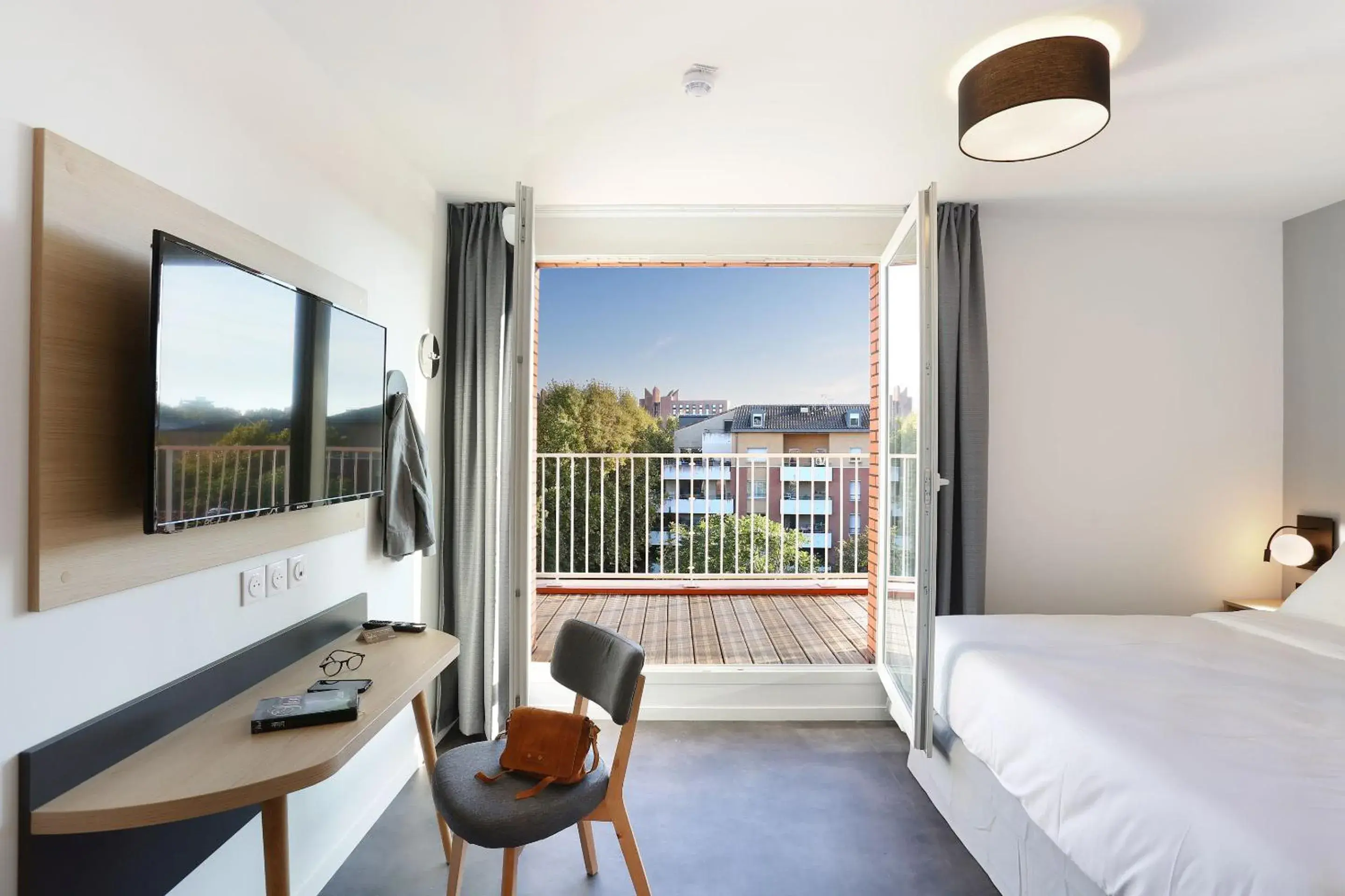 Bedroom, Bed in Appart Hotel Odalys City Toulouse Centre Compans Caffarelli Bedroom, Bed in Appart Hotel Odalys City Toulouse Centre Compans Caffarelli