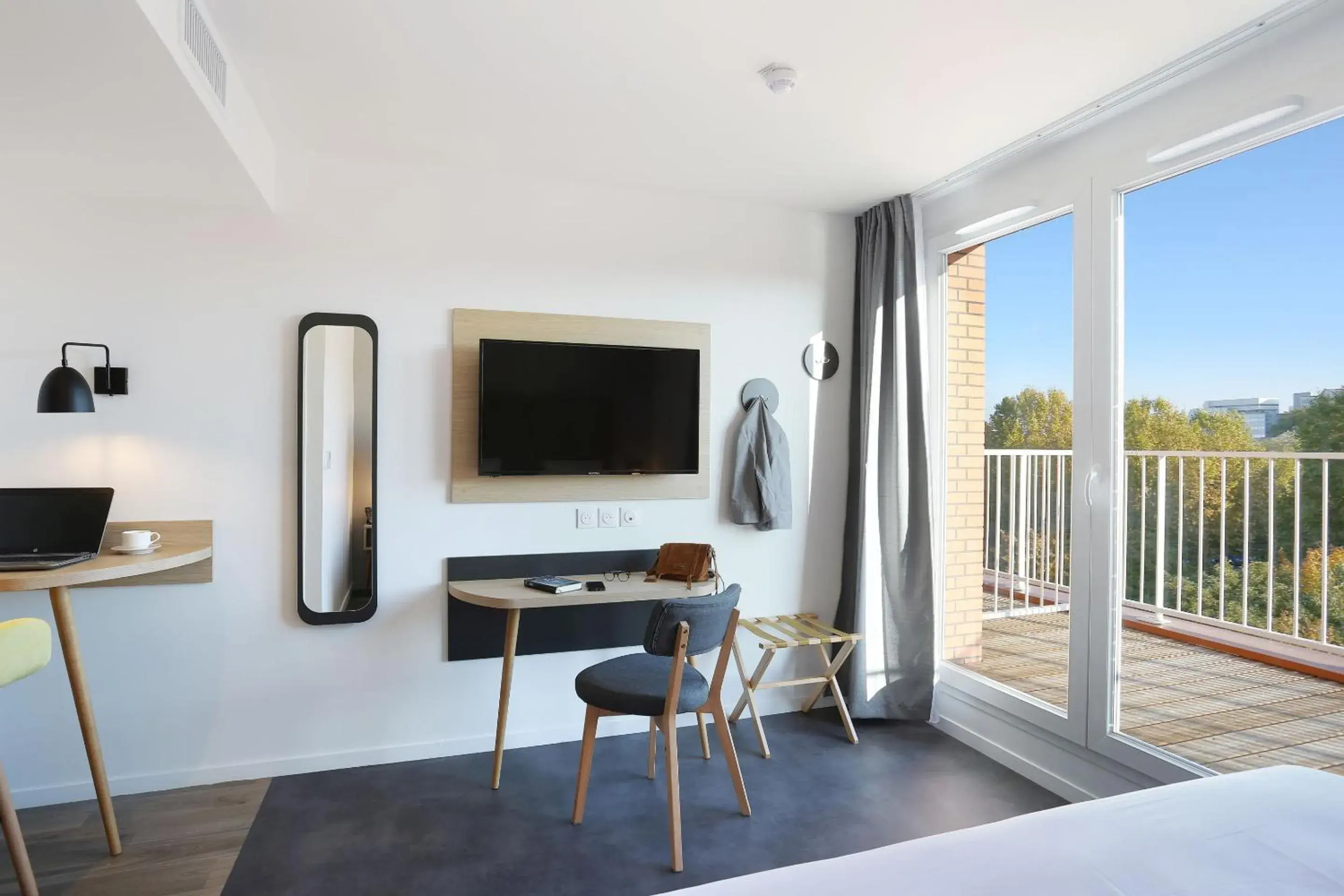 Seating area, Bed in Appart Hotel Odalys City Toulouse Centre Compans Caffarelli Seating area, Bed in Appart Hotel Odalys City Toulouse Centre Compans Caffarelli