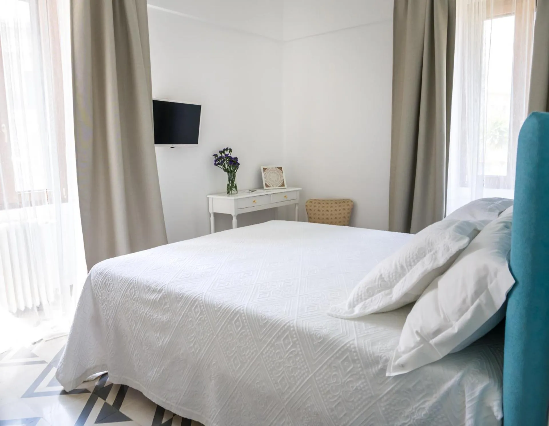 Bed in Villa Aurelia Suites and Apartments