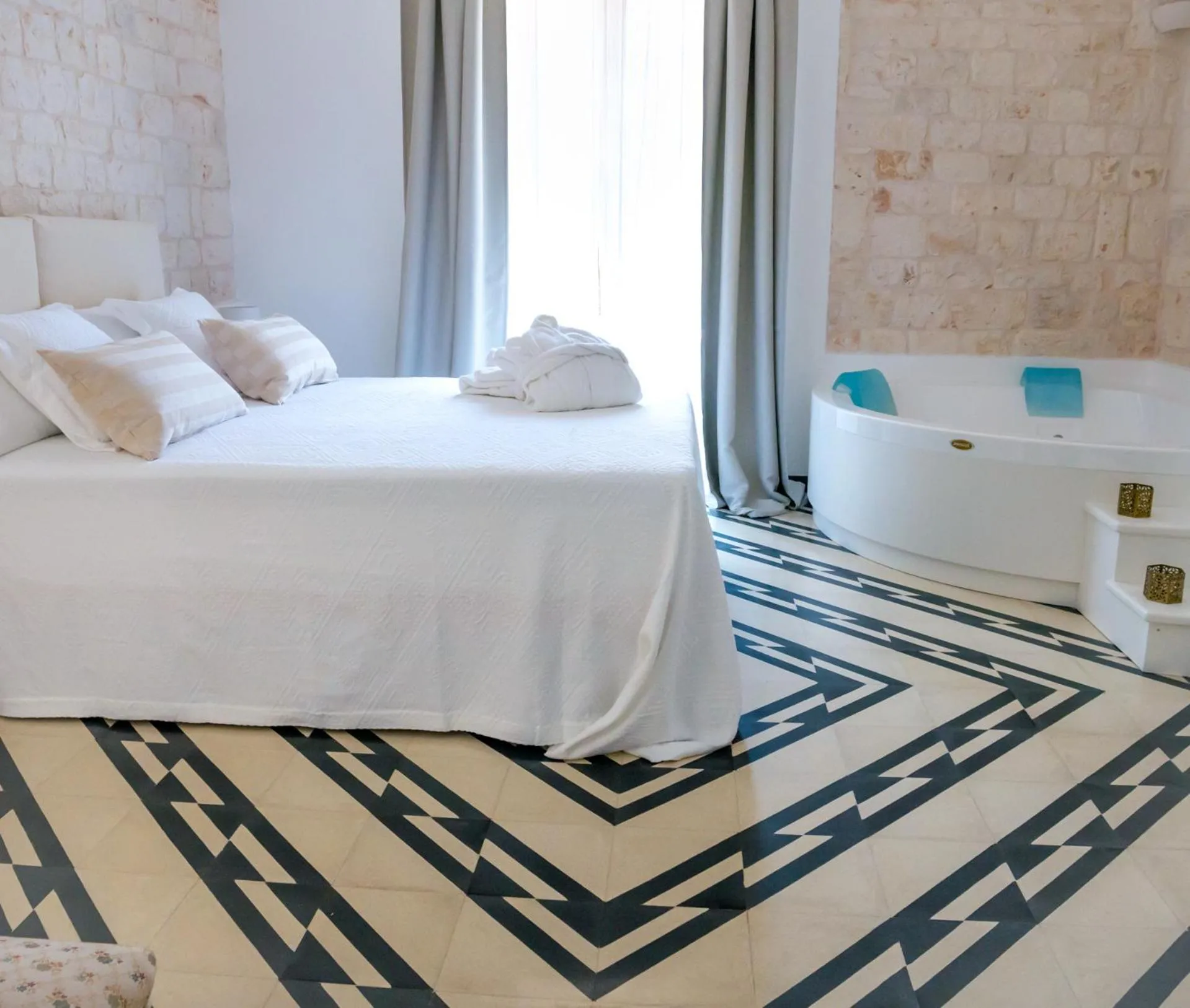 Bed in Villa Aurelia Suites and Apartments