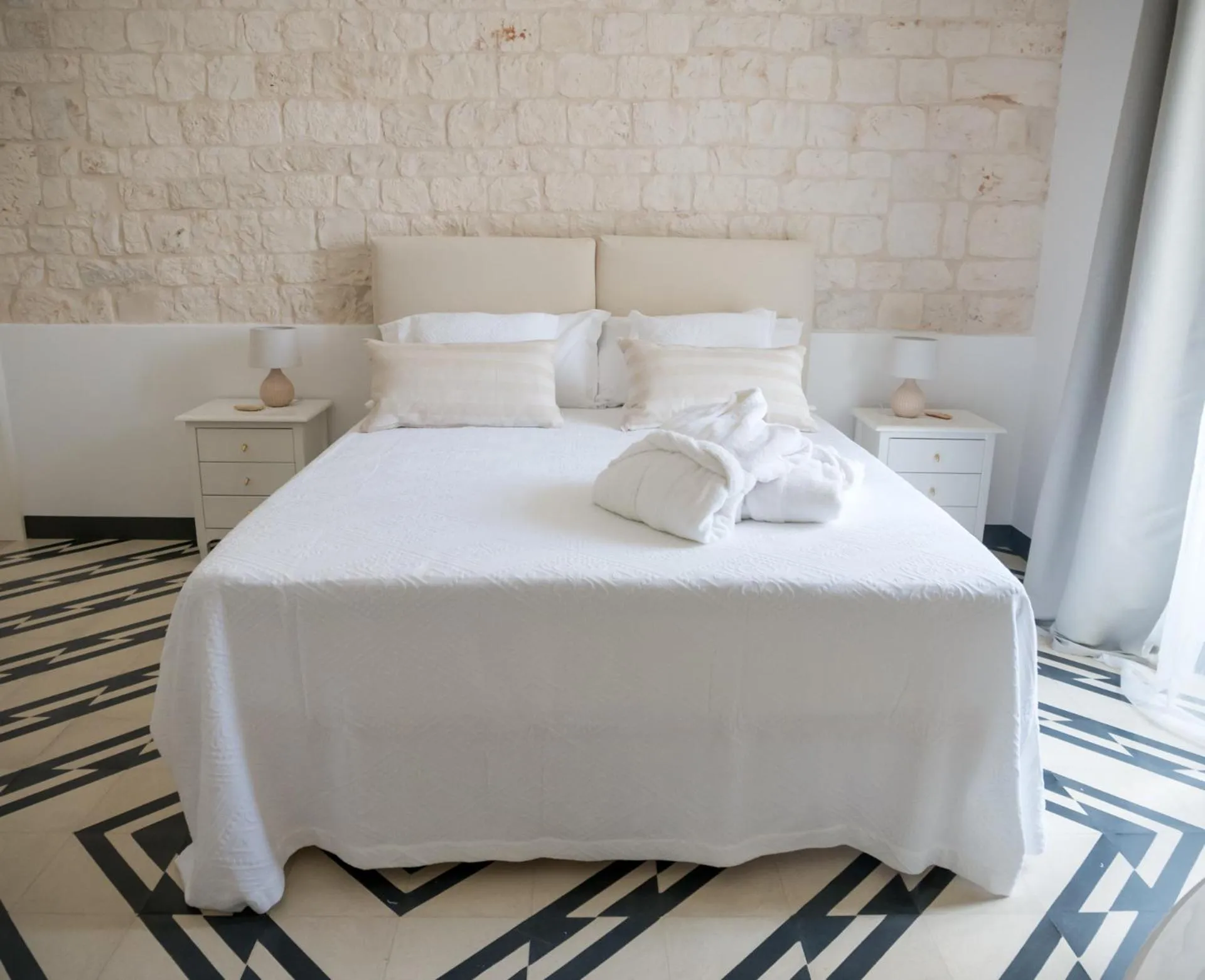 Bed in Villa Aurelia Suites and Apartments