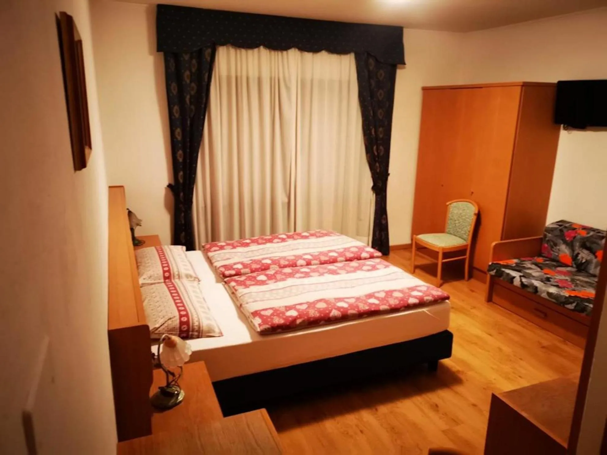 Bed in Hotel Rosalpina
