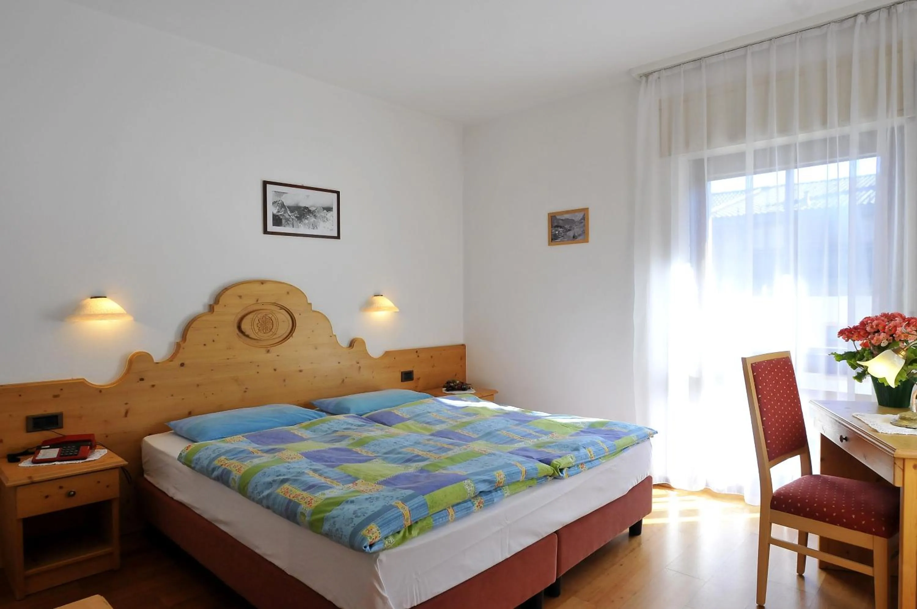 Bed in Hotel Rosalpina
