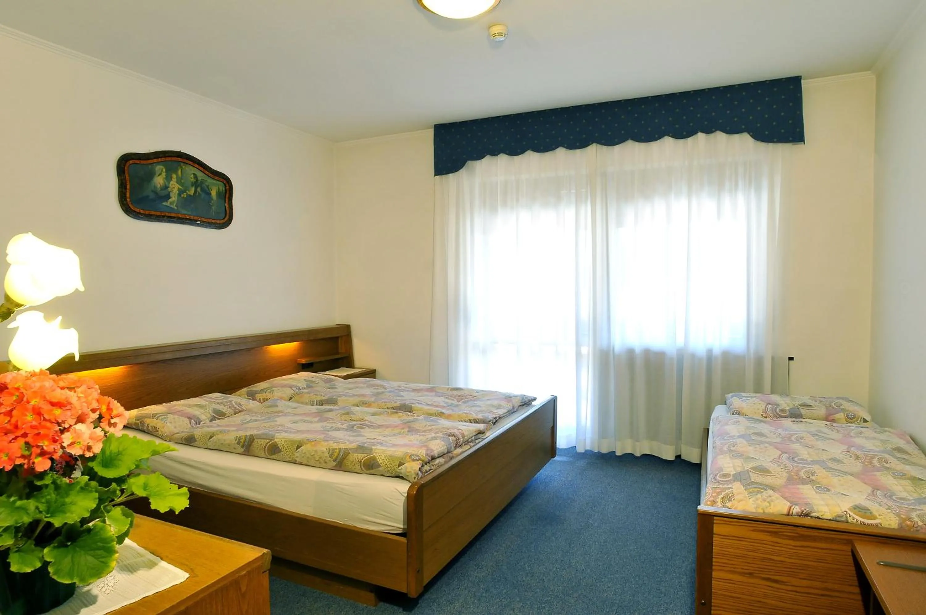 Bed in Hotel Rosalpina
