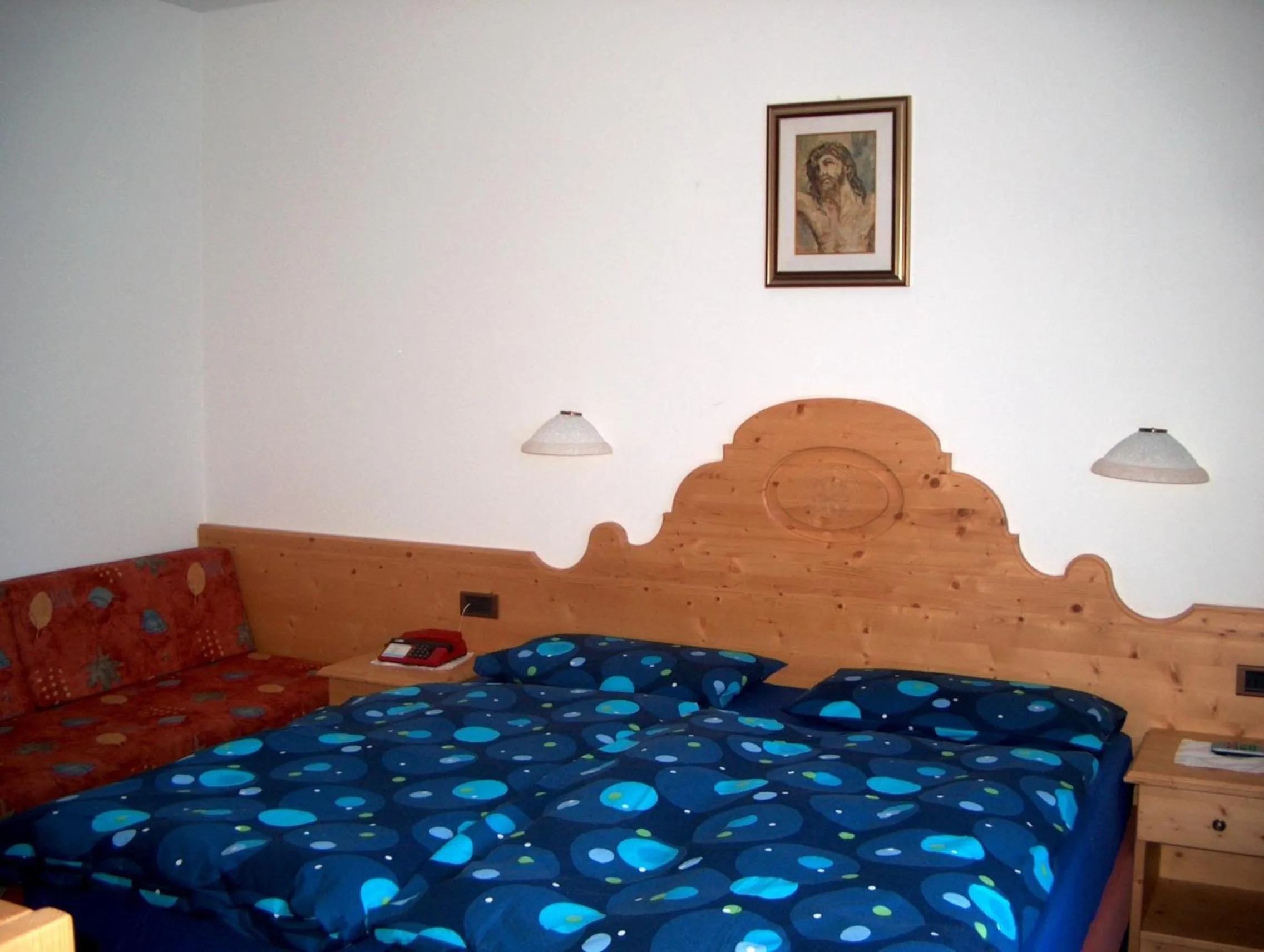 Bed in Hotel Rosalpina