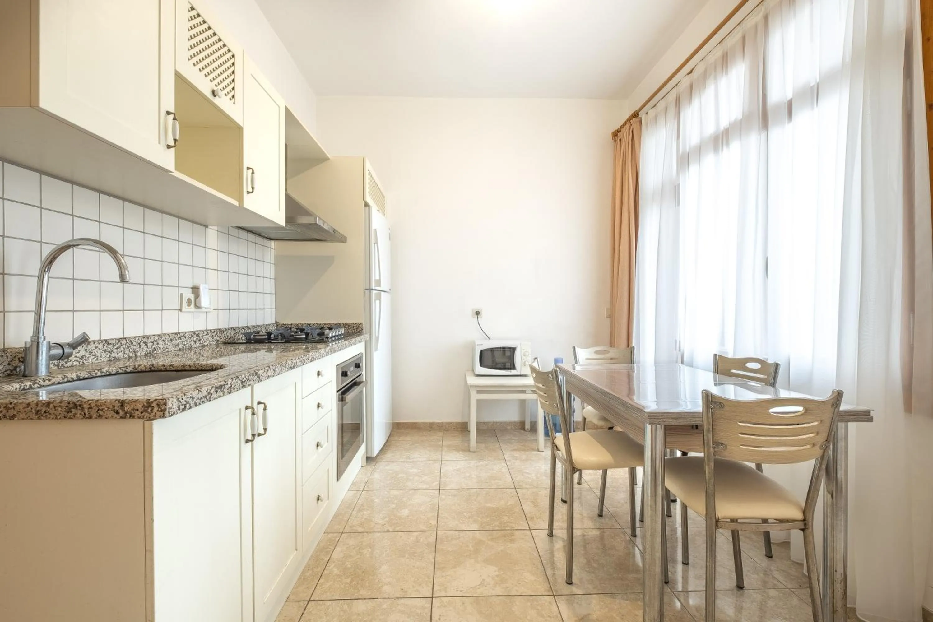 Kitchen or kitchenette in Old Town Deluxe Flats