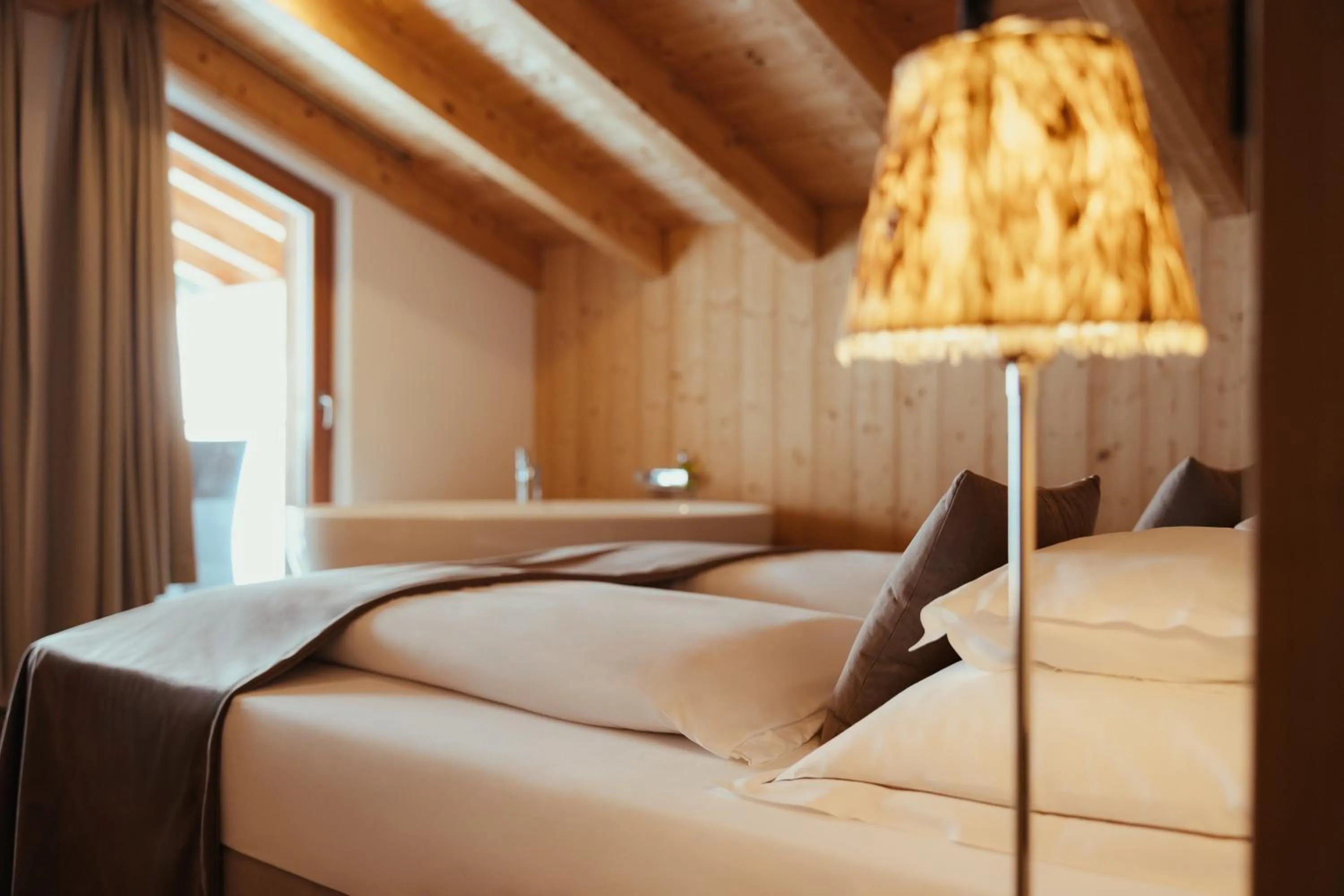 Bed in Villa Flora Mountain Lodges