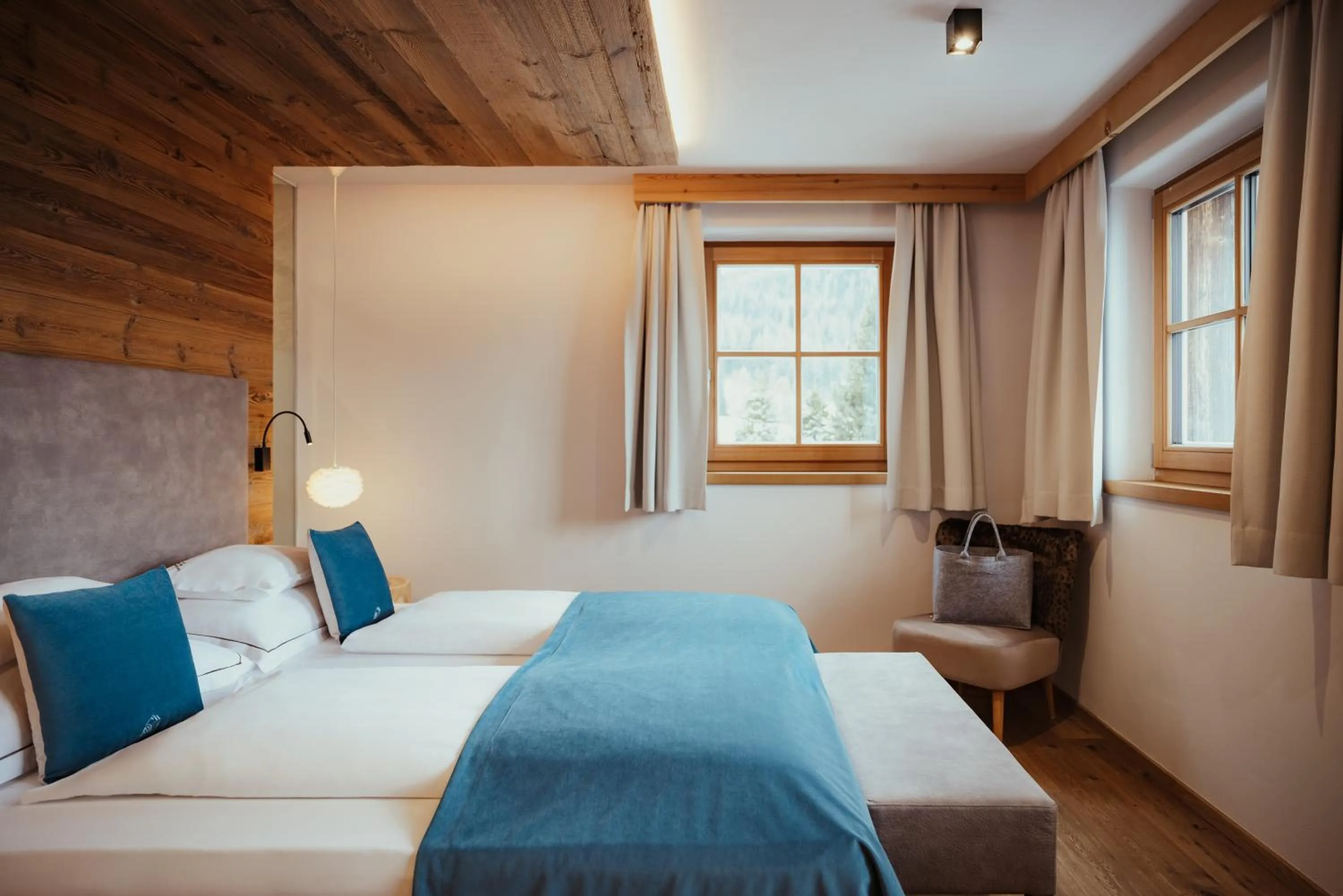 Bed in Villa Flora Mountain Lodges