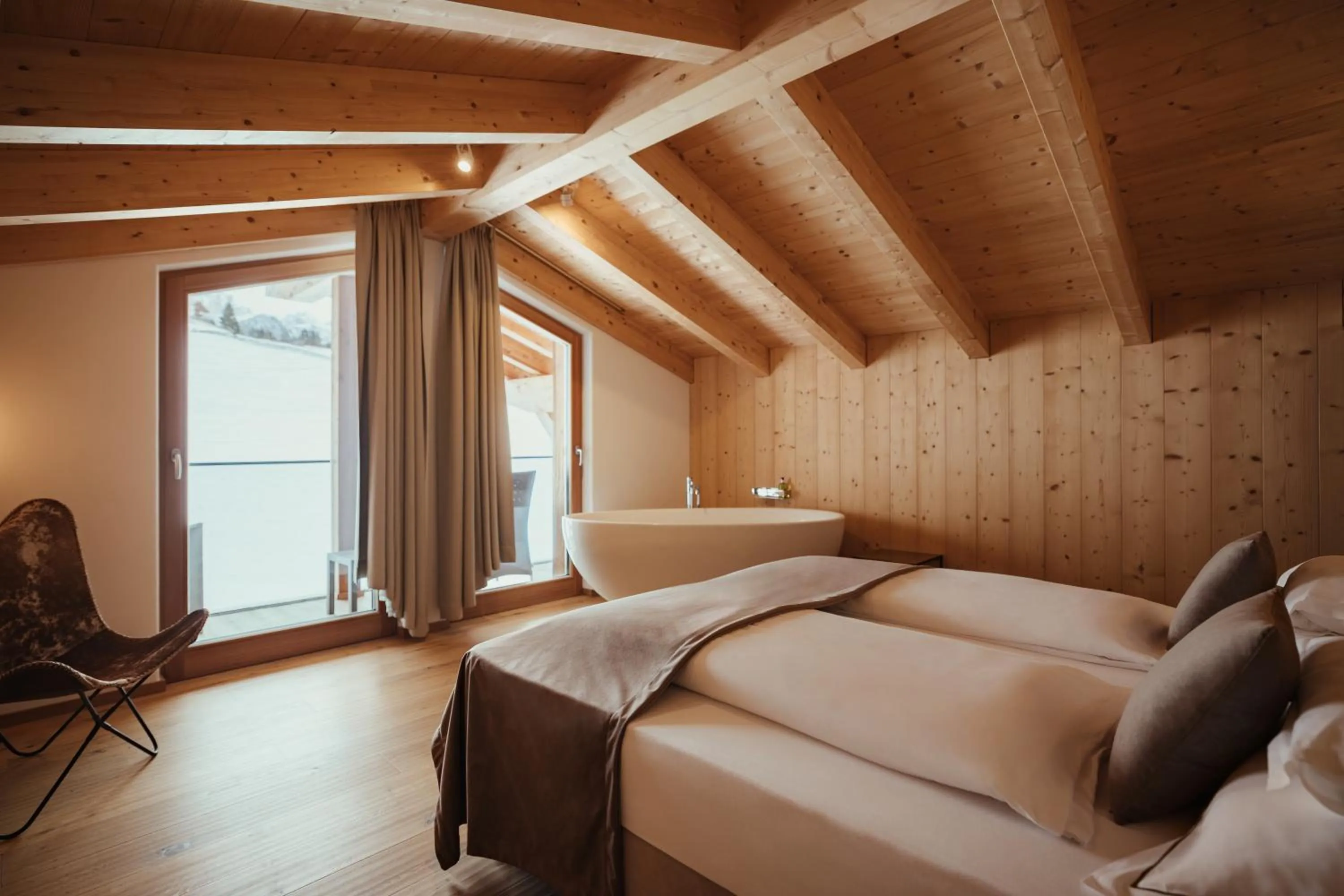 Bed in Villa Flora Mountain Lodges