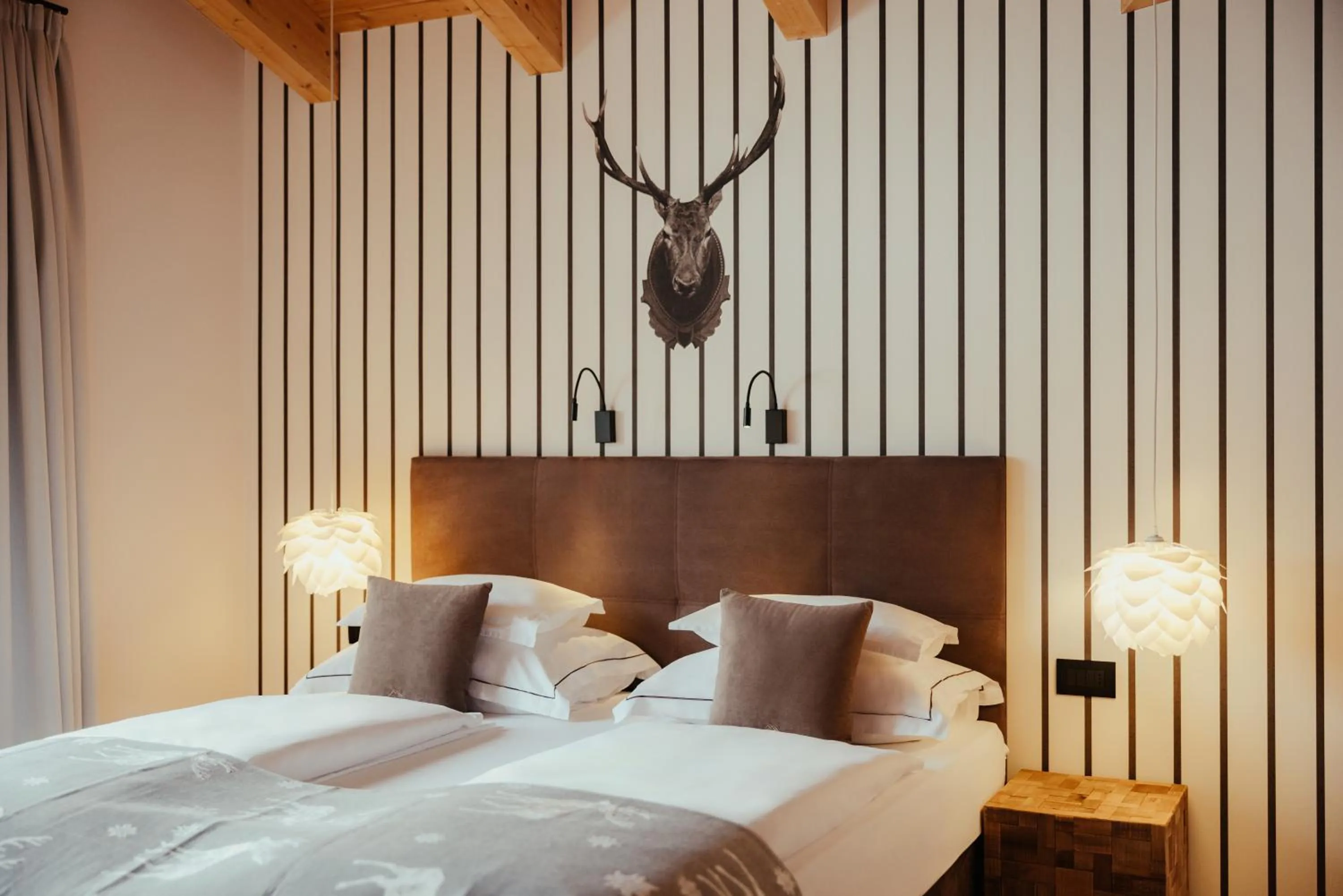 Bed in Villa Flora Mountain Lodges