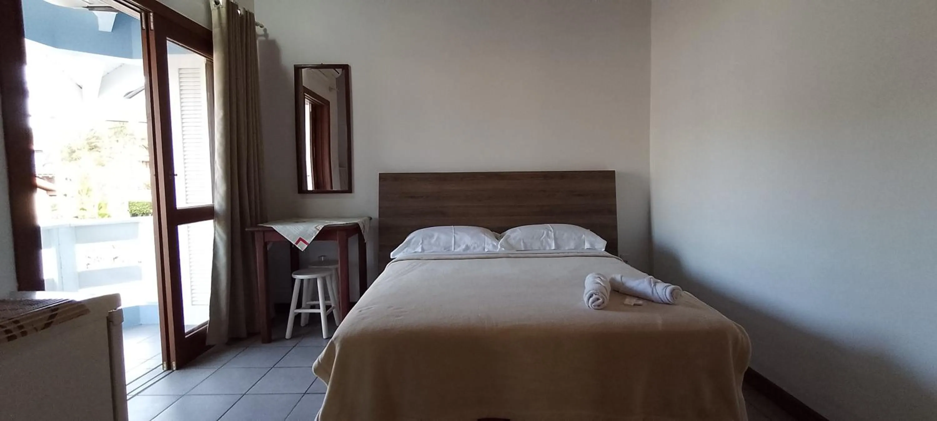 Bed in Residencial da Praça Garopaba