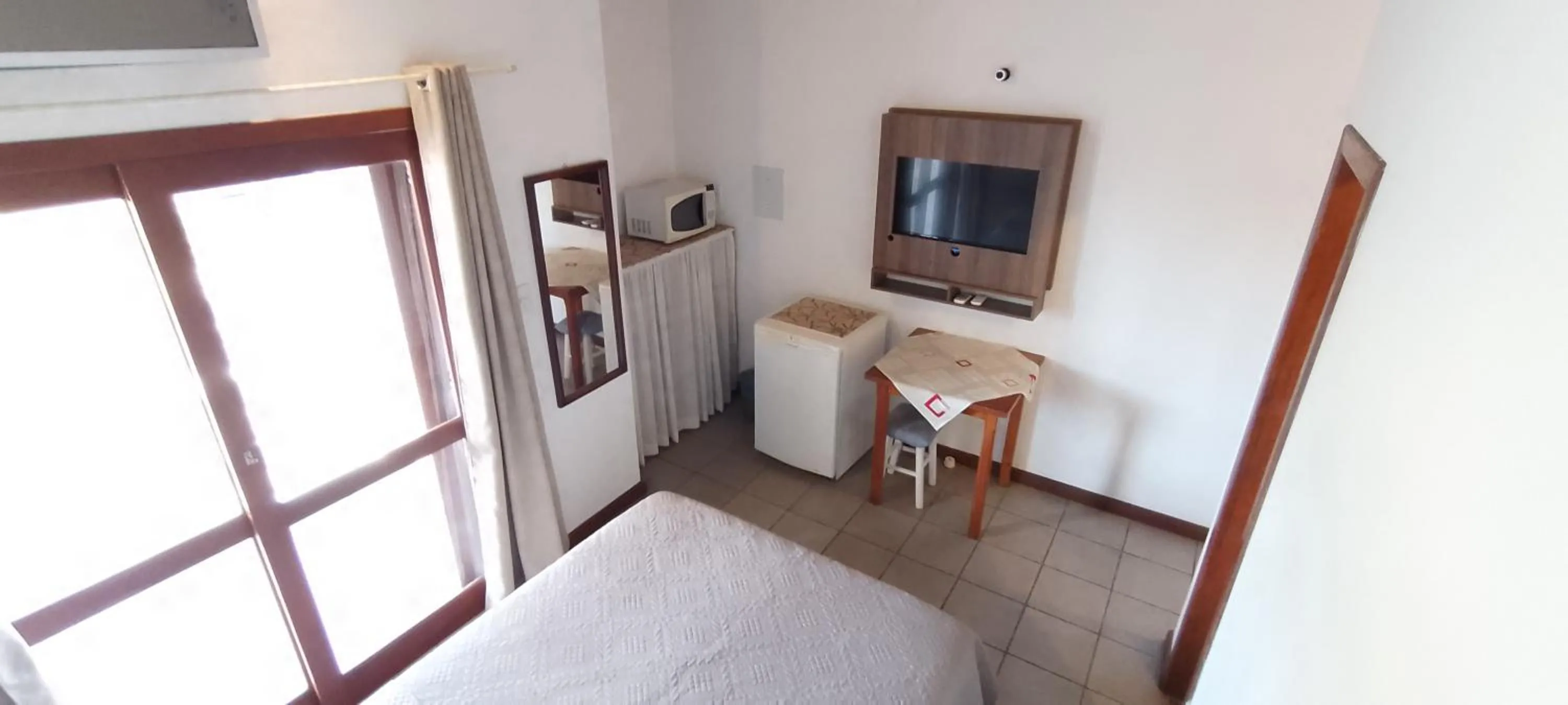 Bed in Residencial da Praça Garopaba