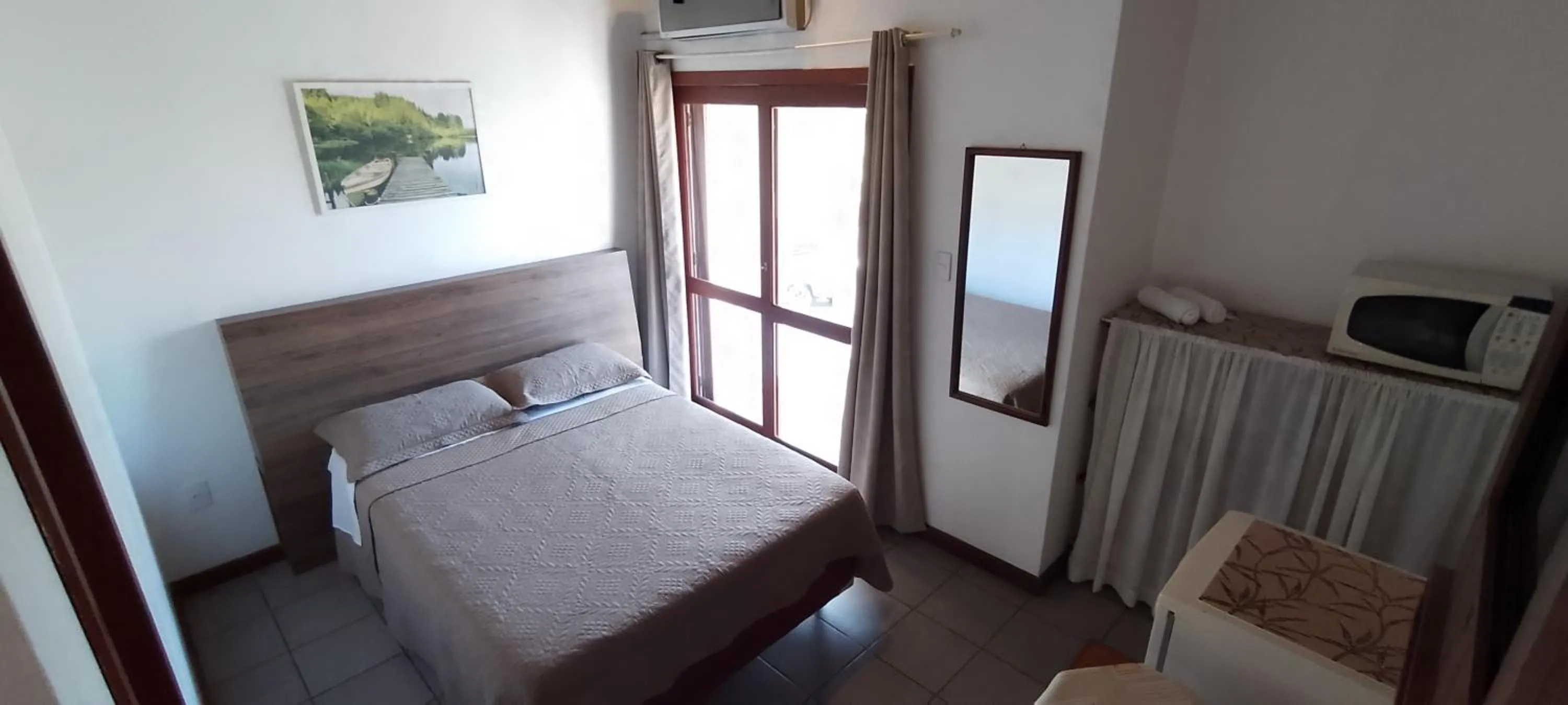 Bed in Residencial da Praça Garopaba