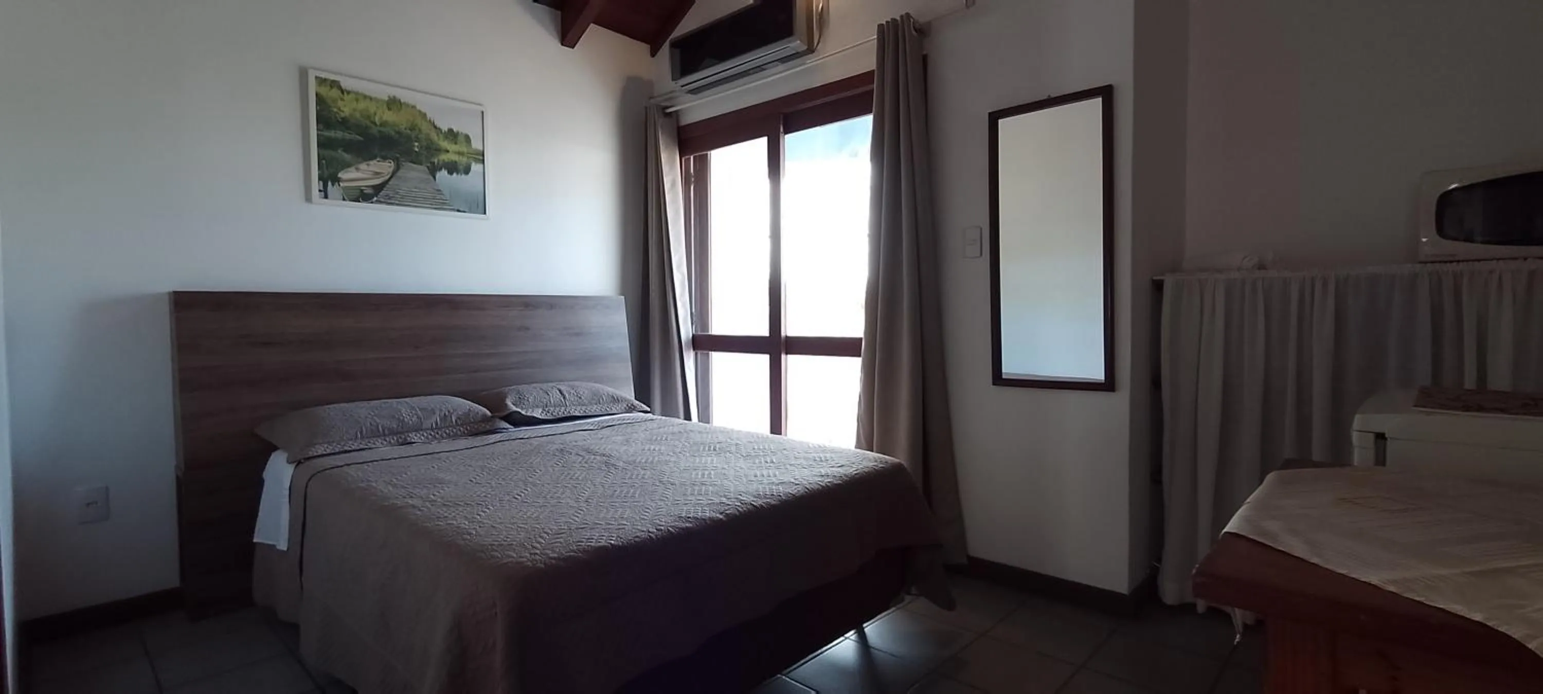Bed in Residencial da Praça Garopaba