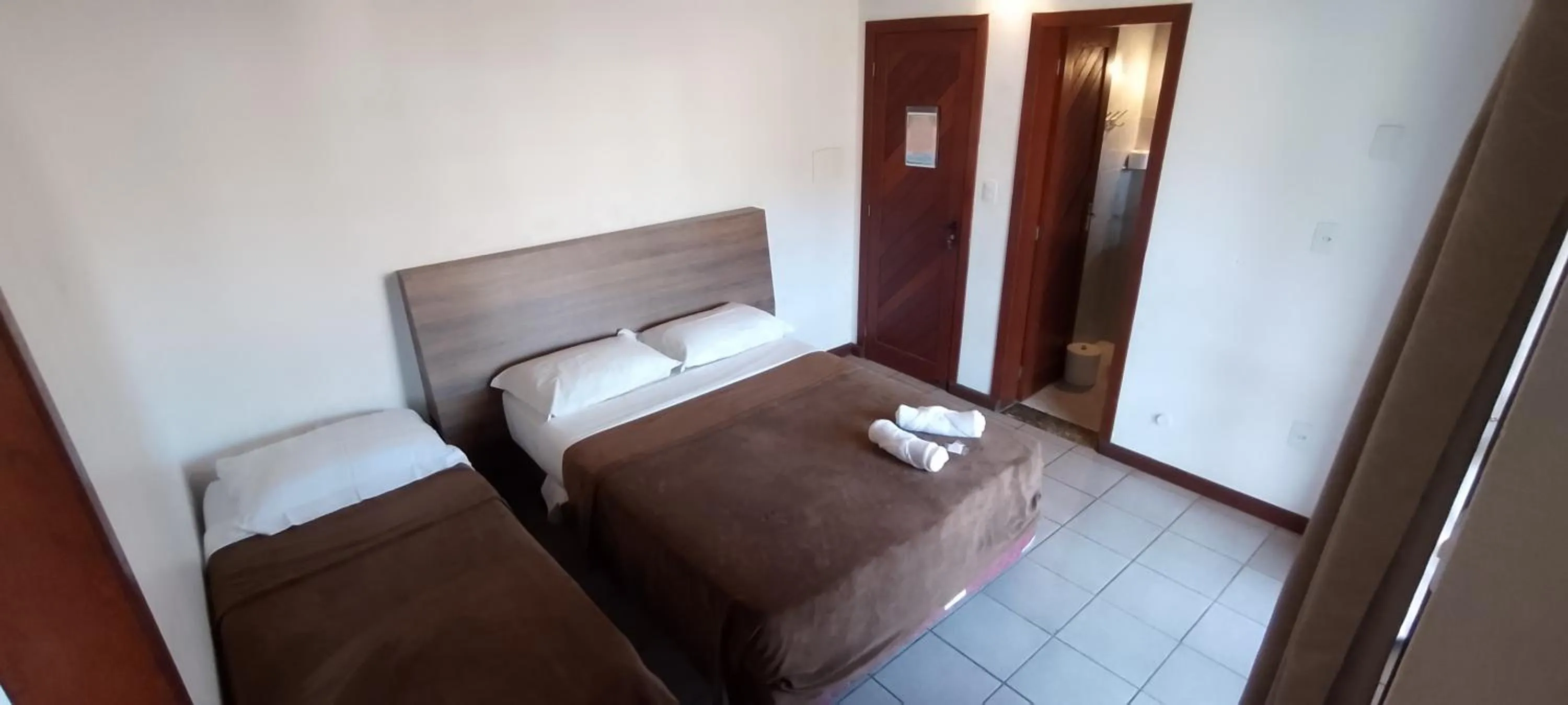 Bed in Residencial da Praça Garopaba