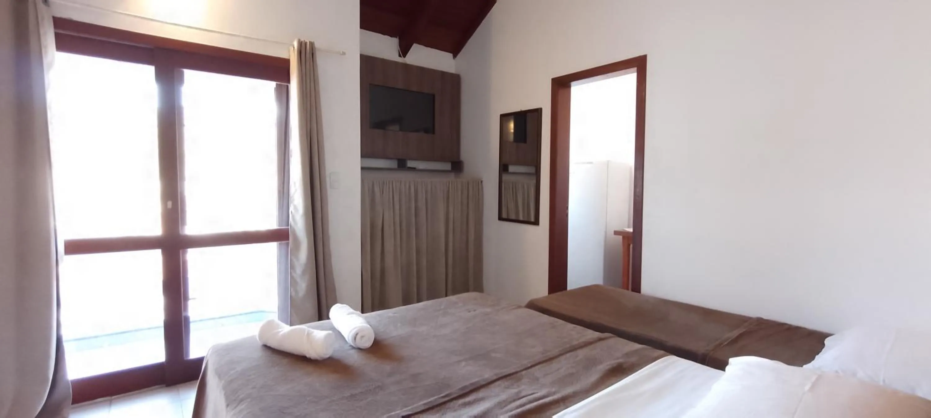 Bed in Residencial da Praça Garopaba