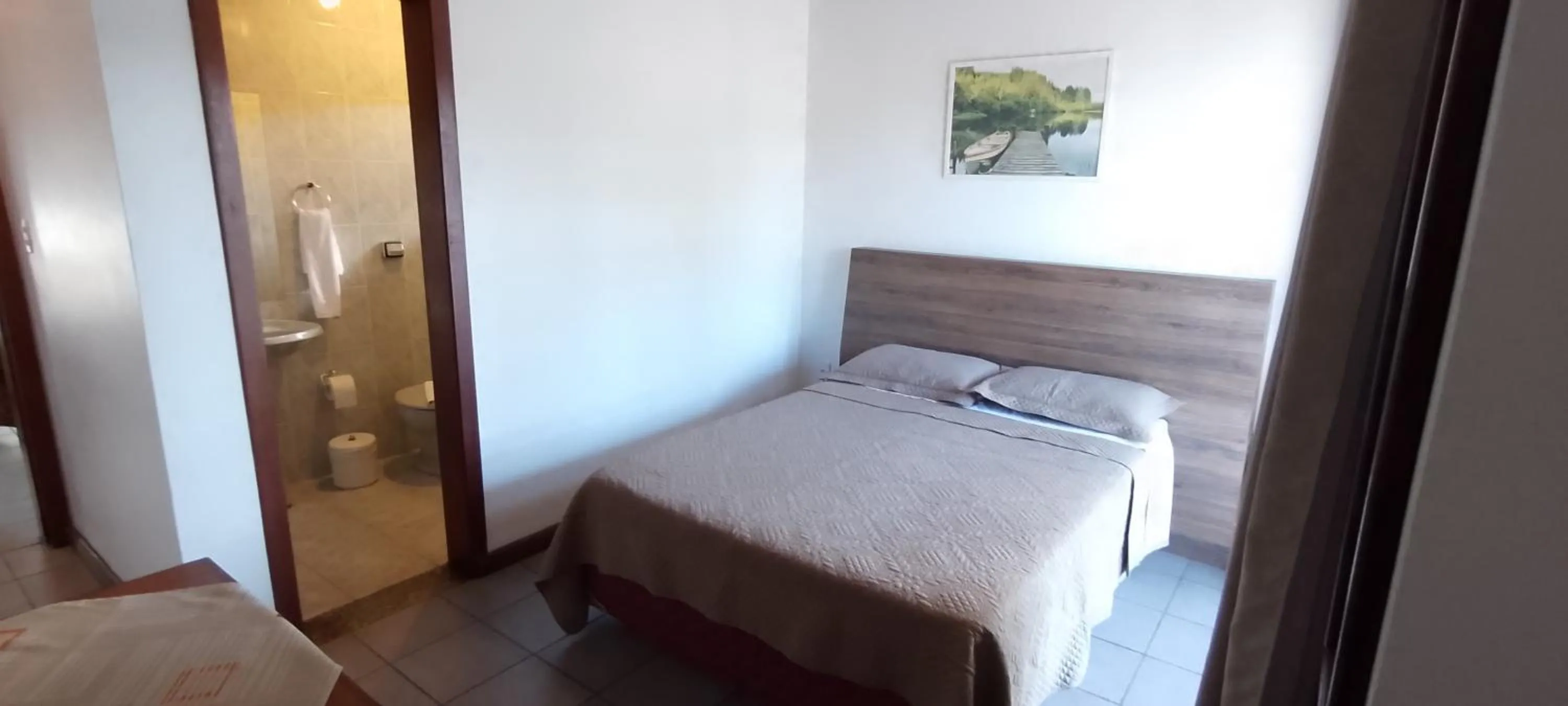 Bed in Residencial da Praça Garopaba