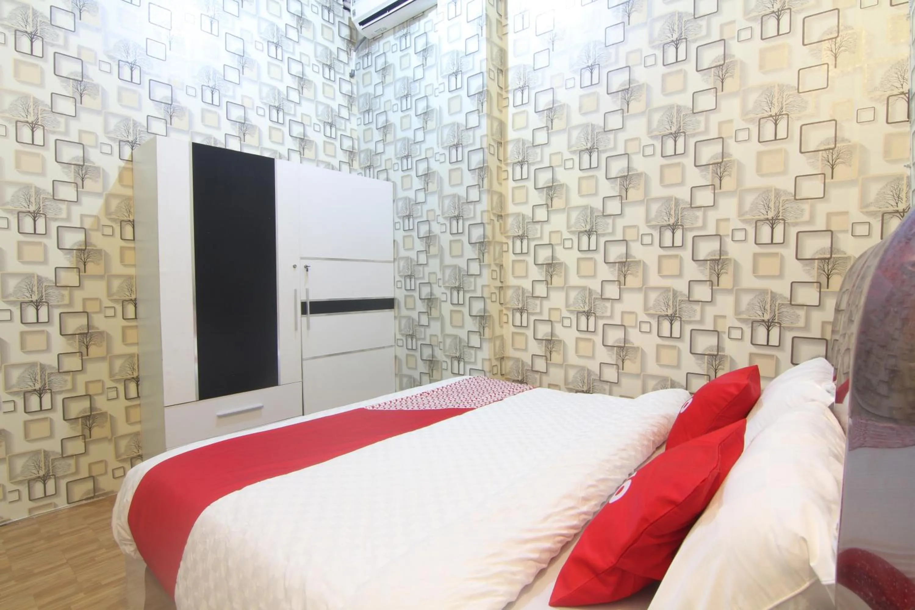 Bedroom in OYO 90615 Jojo Homestay