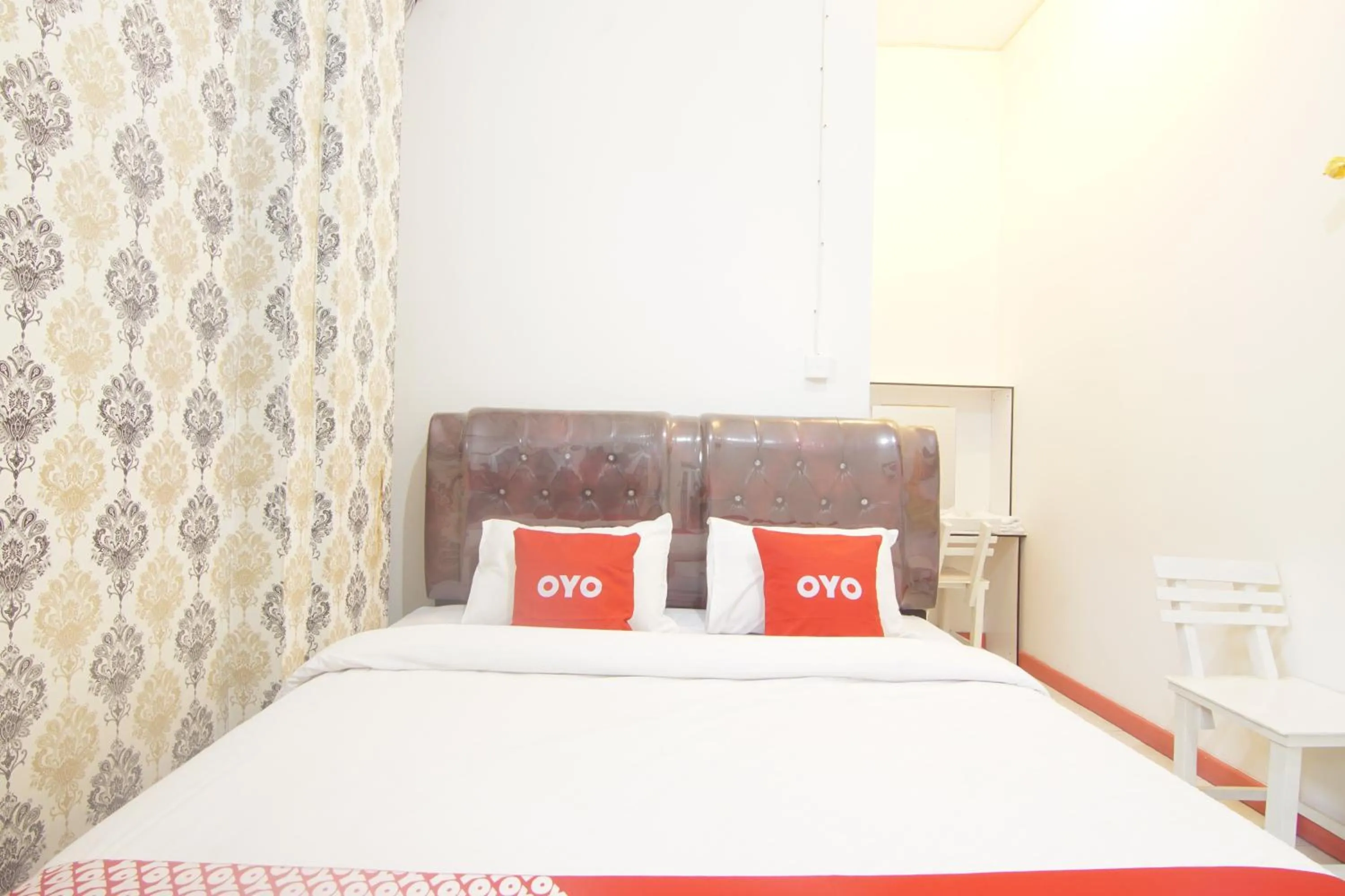 Bedroom in OYO 90615 Jojo Homestay