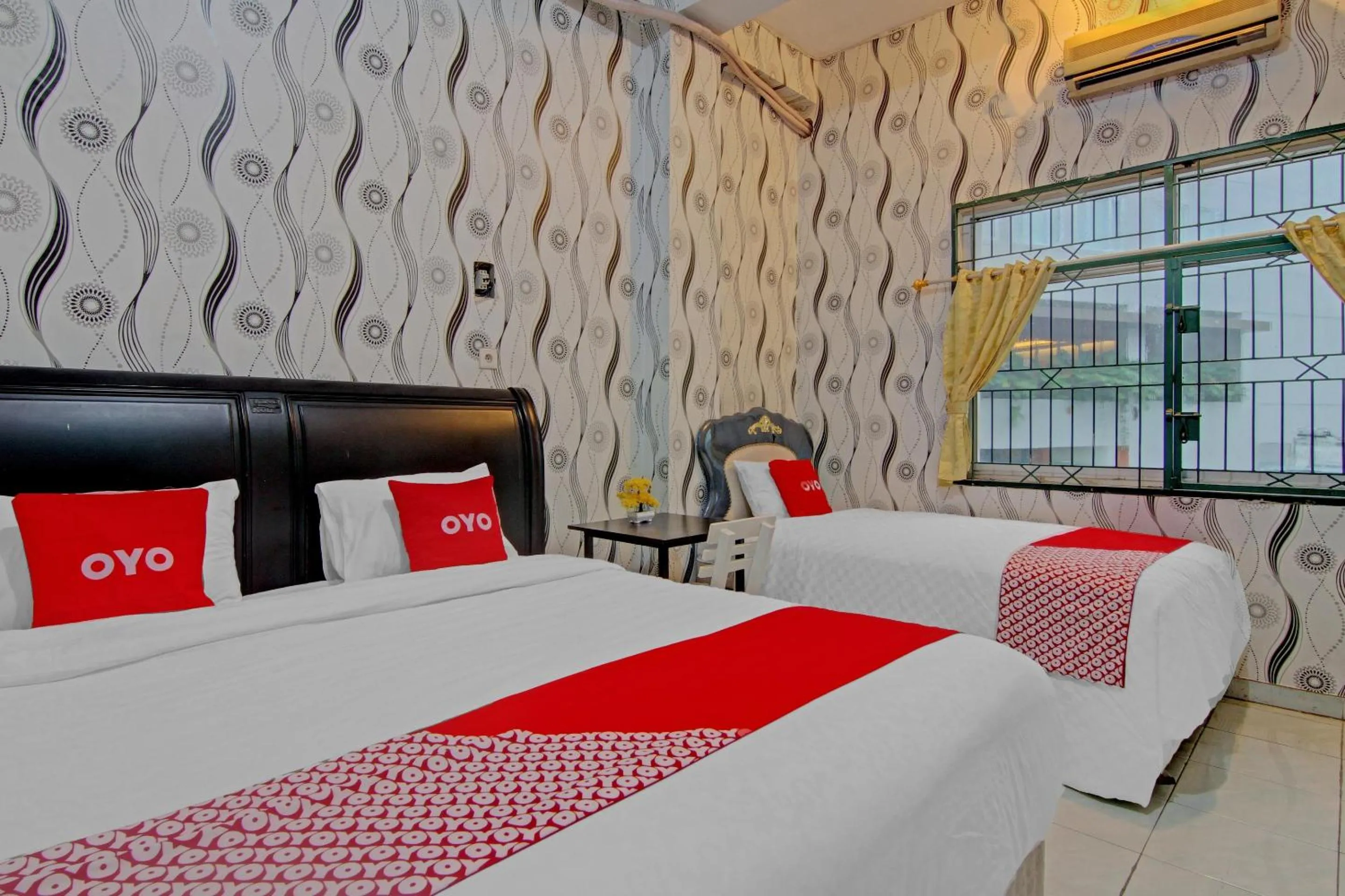 Bedroom in OYO 90615 Jojo Homestay