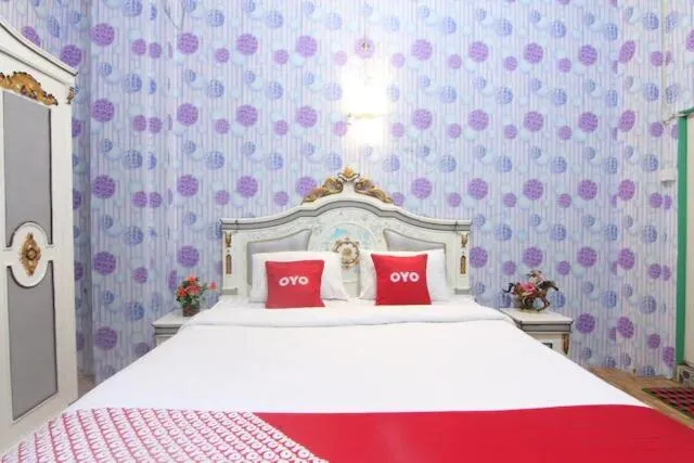 Bedroom in OYO 90615 Jojo Homestay