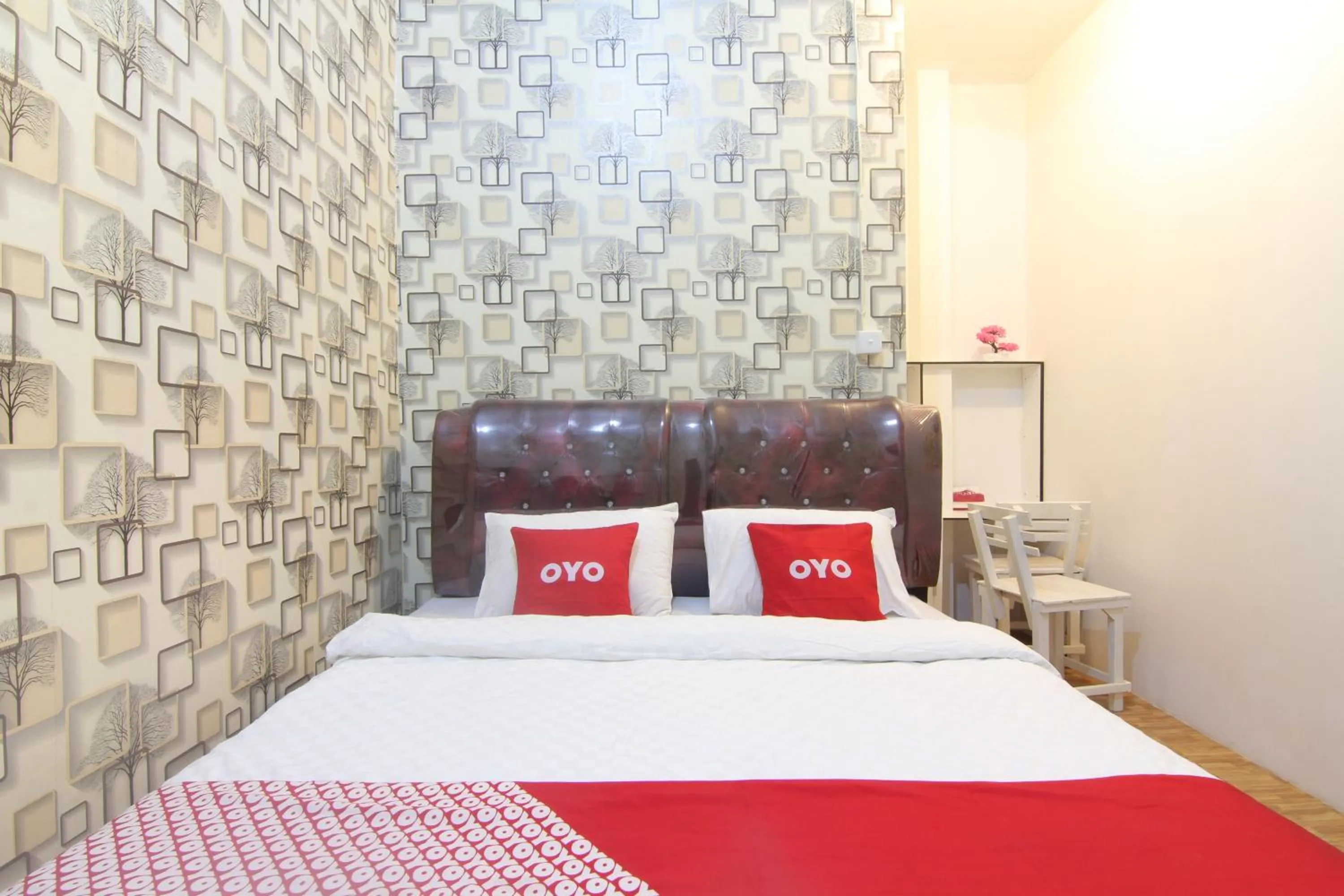 Bedroom in OYO 90615 Jojo Homestay