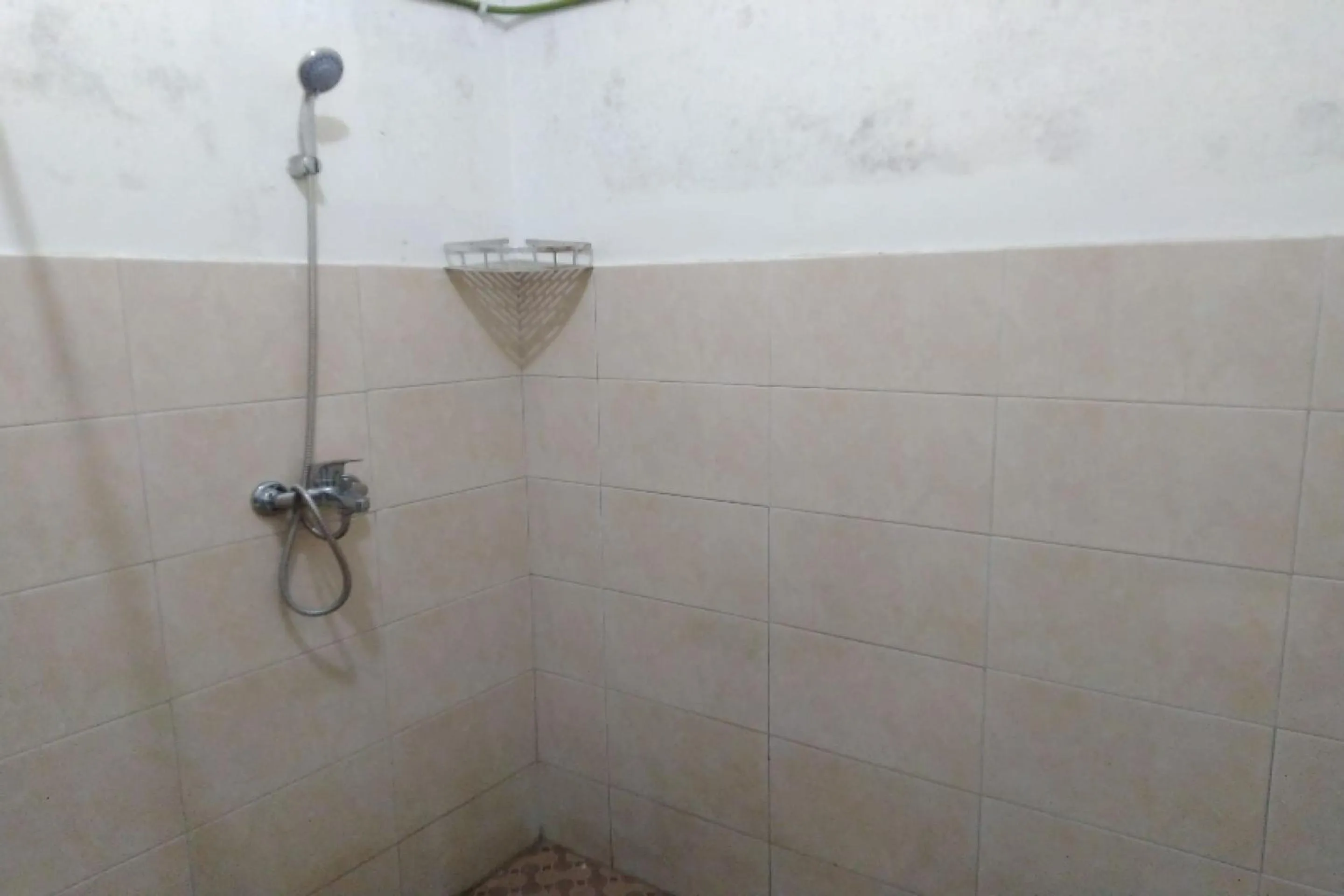 Bathroom in Hotel O Spring Homestay