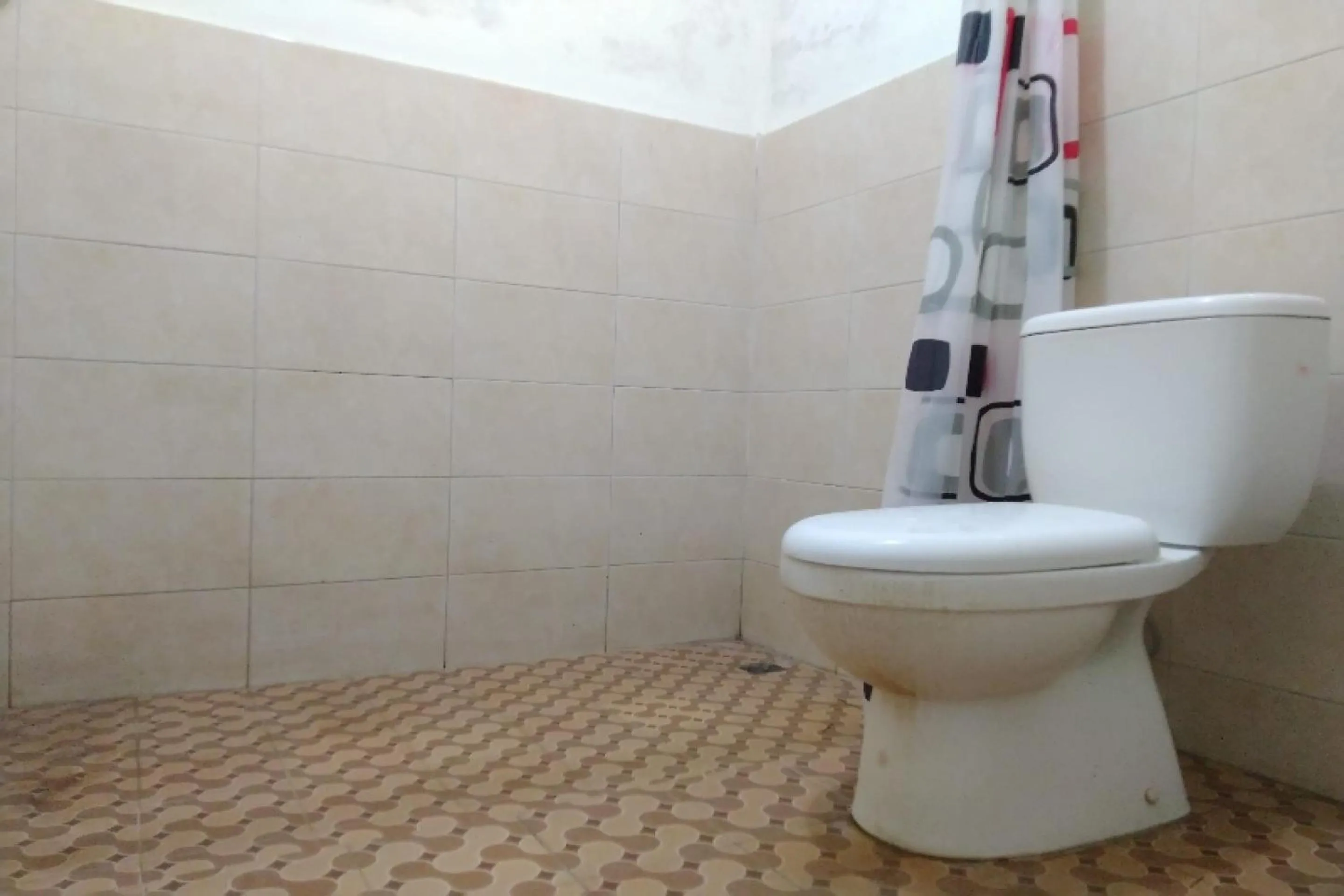 Bathroom in Hotel O Spring Homestay