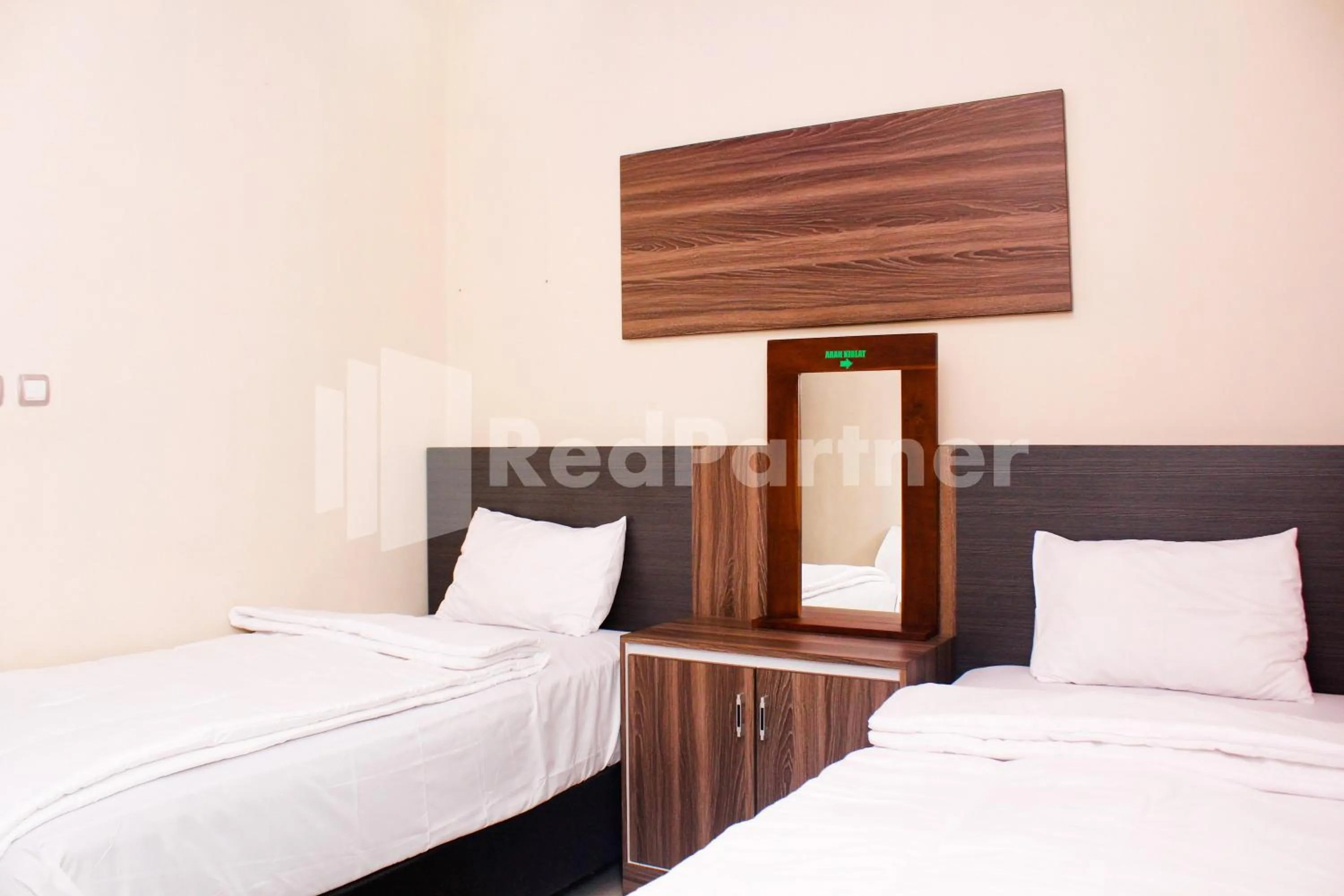 Bed in Hotel Baby Angel Dieng Mitra RedDoorz