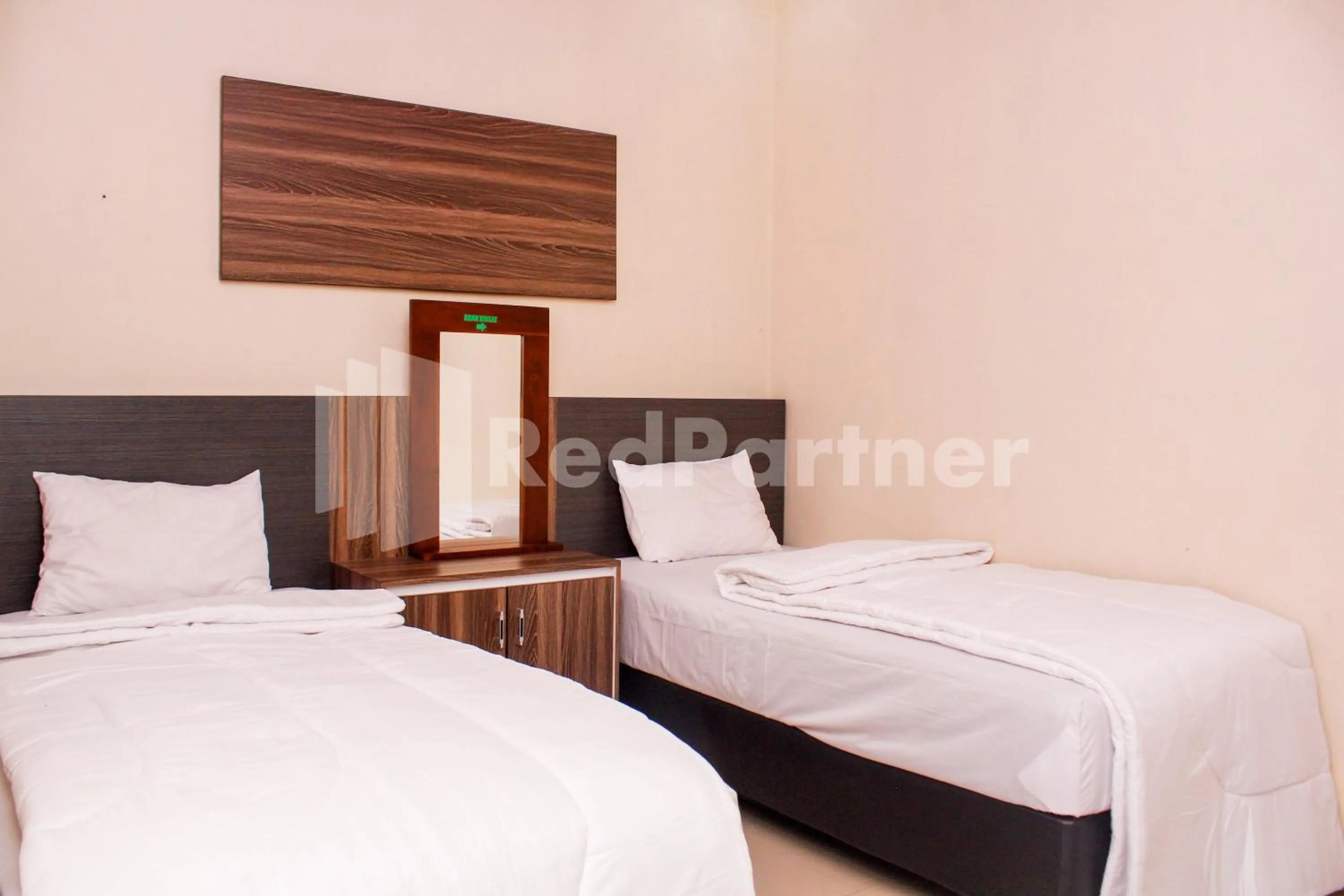 Bed in Hotel Baby Angel Dieng Mitra RedDoorz